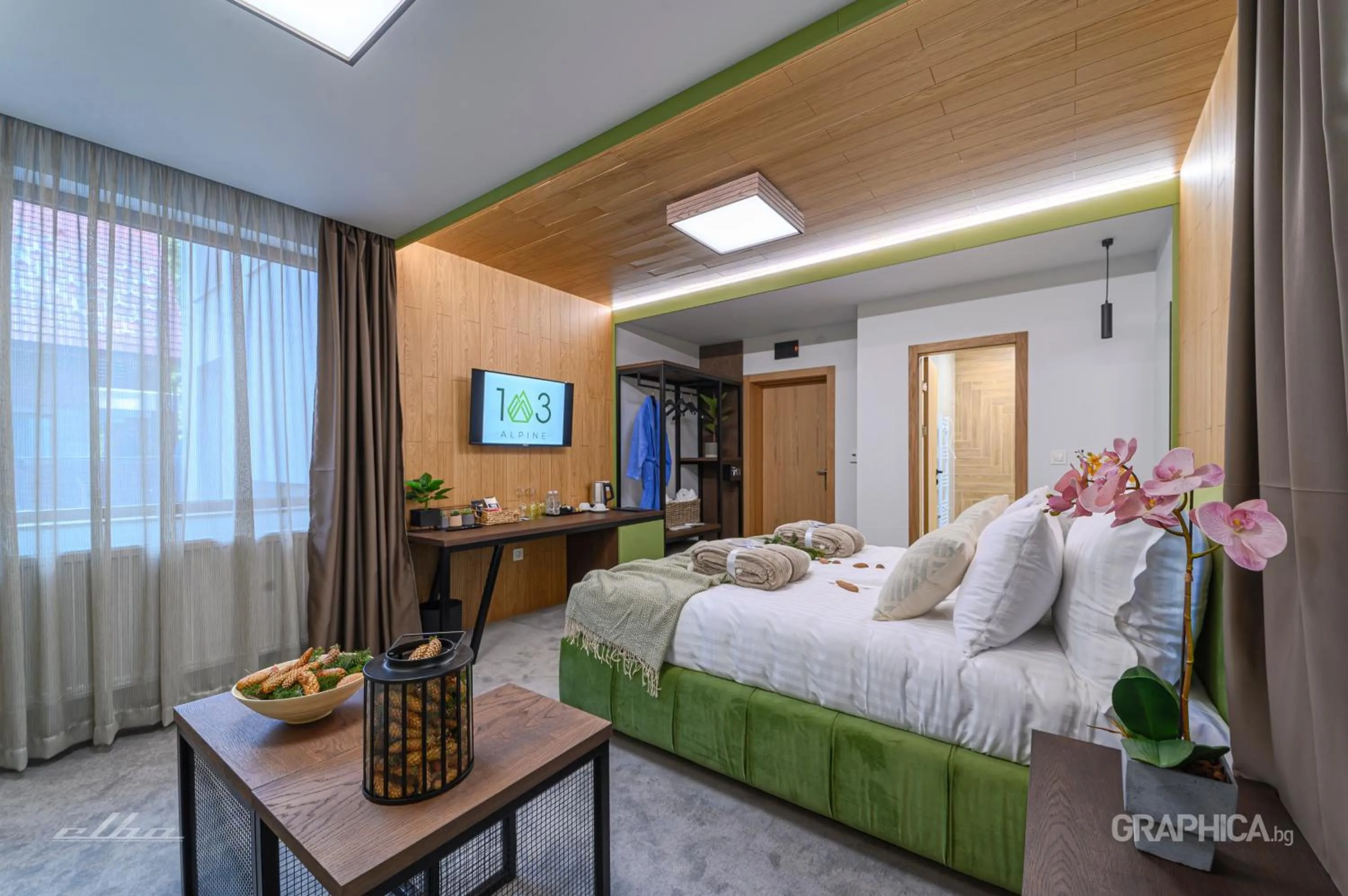 Bed in 103 Alpine Hotel