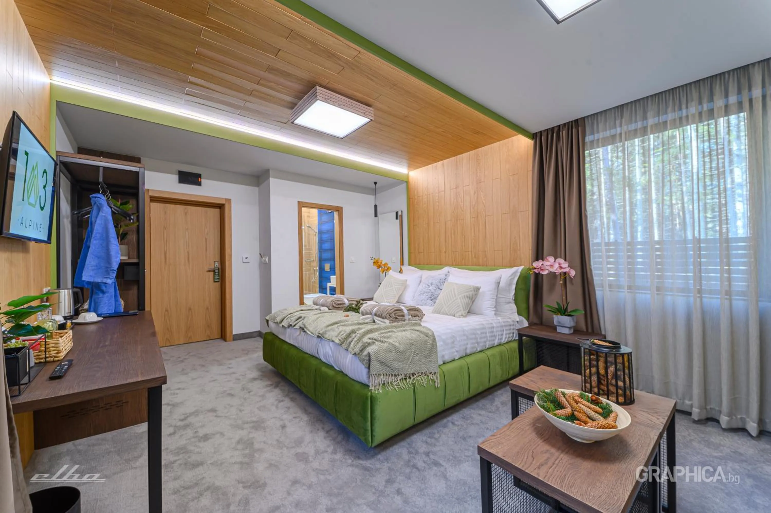 Bed in 103 Alpine Hotel