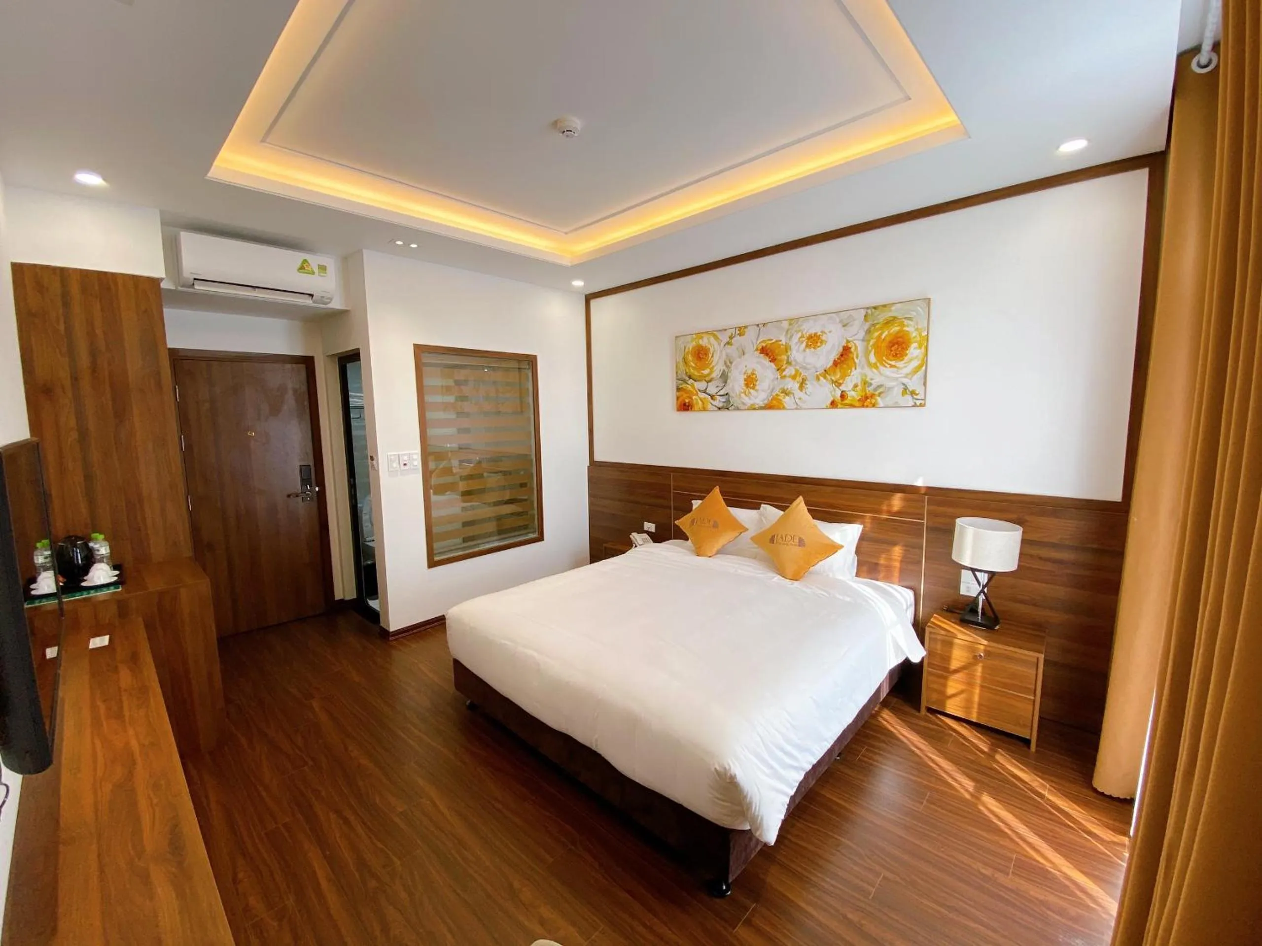 Bed in Jade Ha Long Hotel
