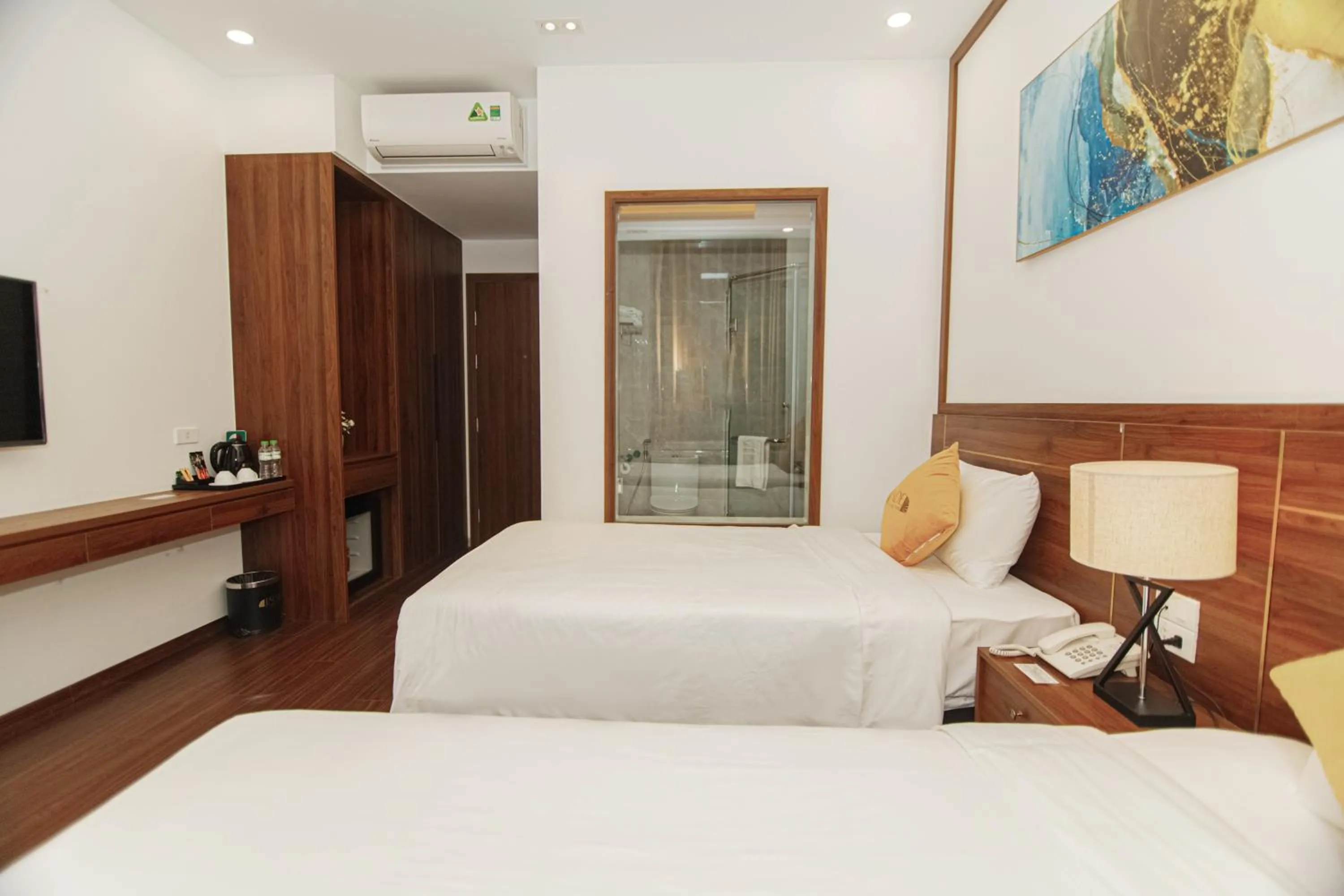 Bed in Jade Ha Long Hotel