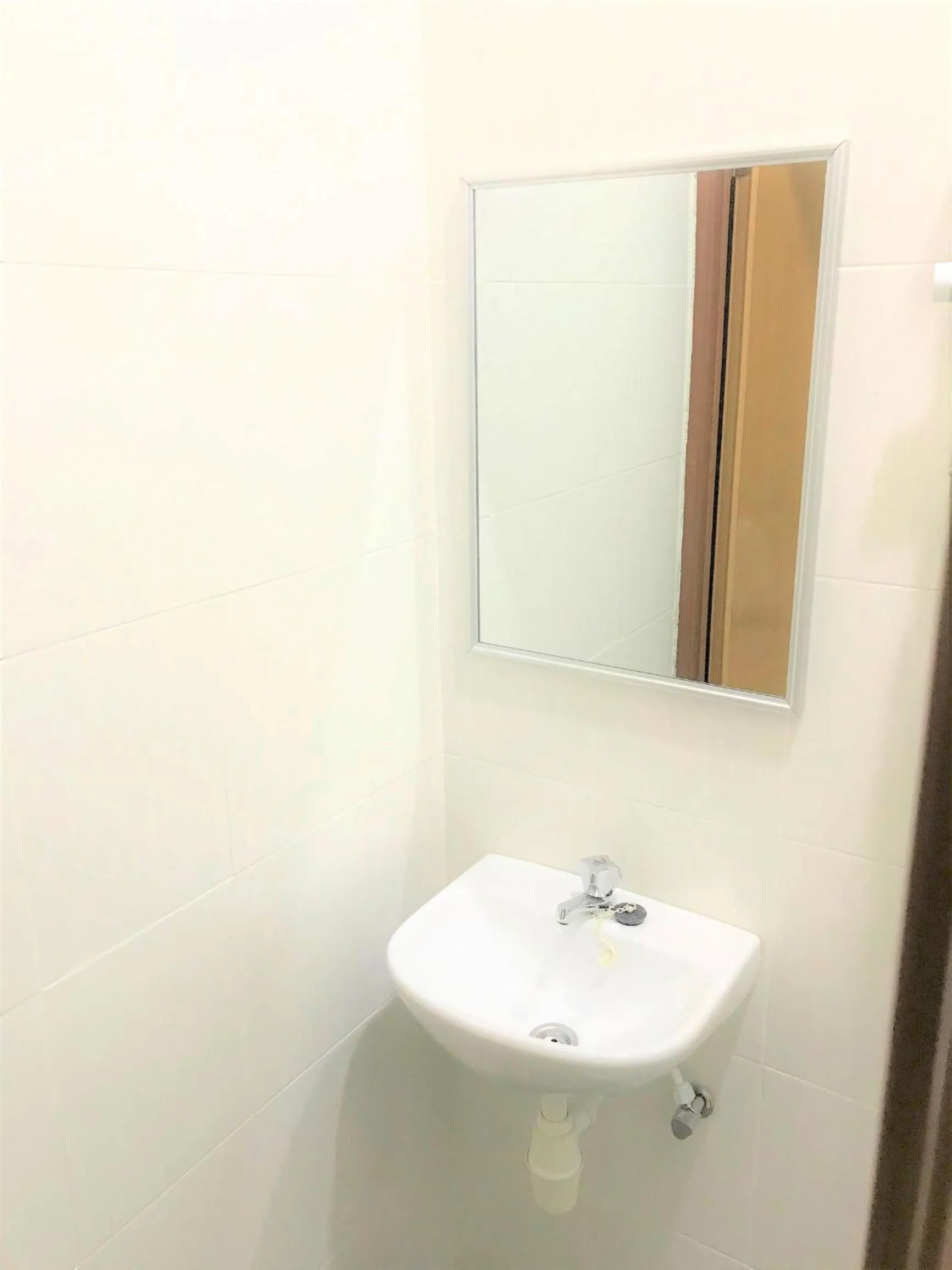 Toilet in iG Hotel