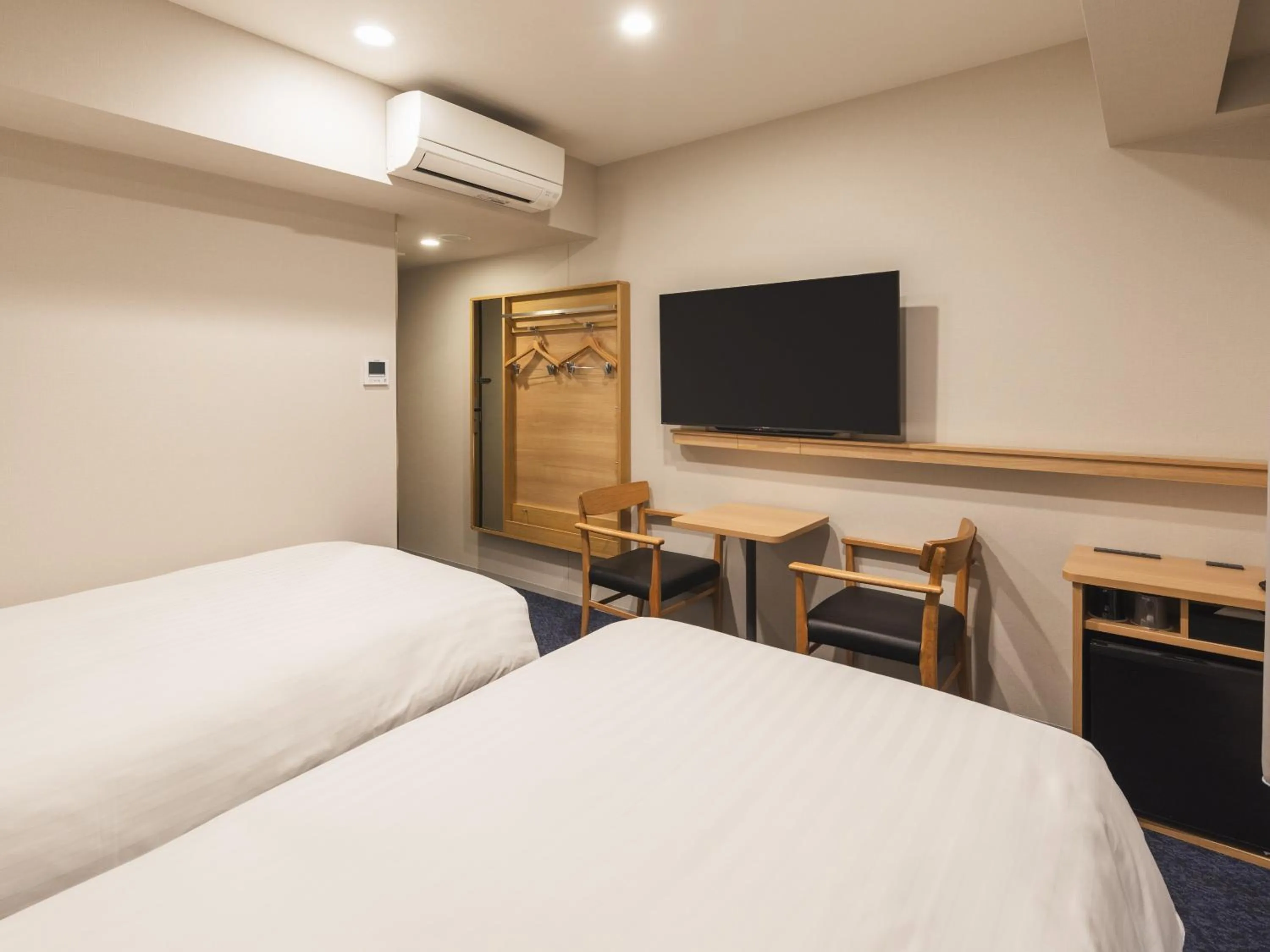 Bed in Sotetsu Fresa Inn Hiroshima