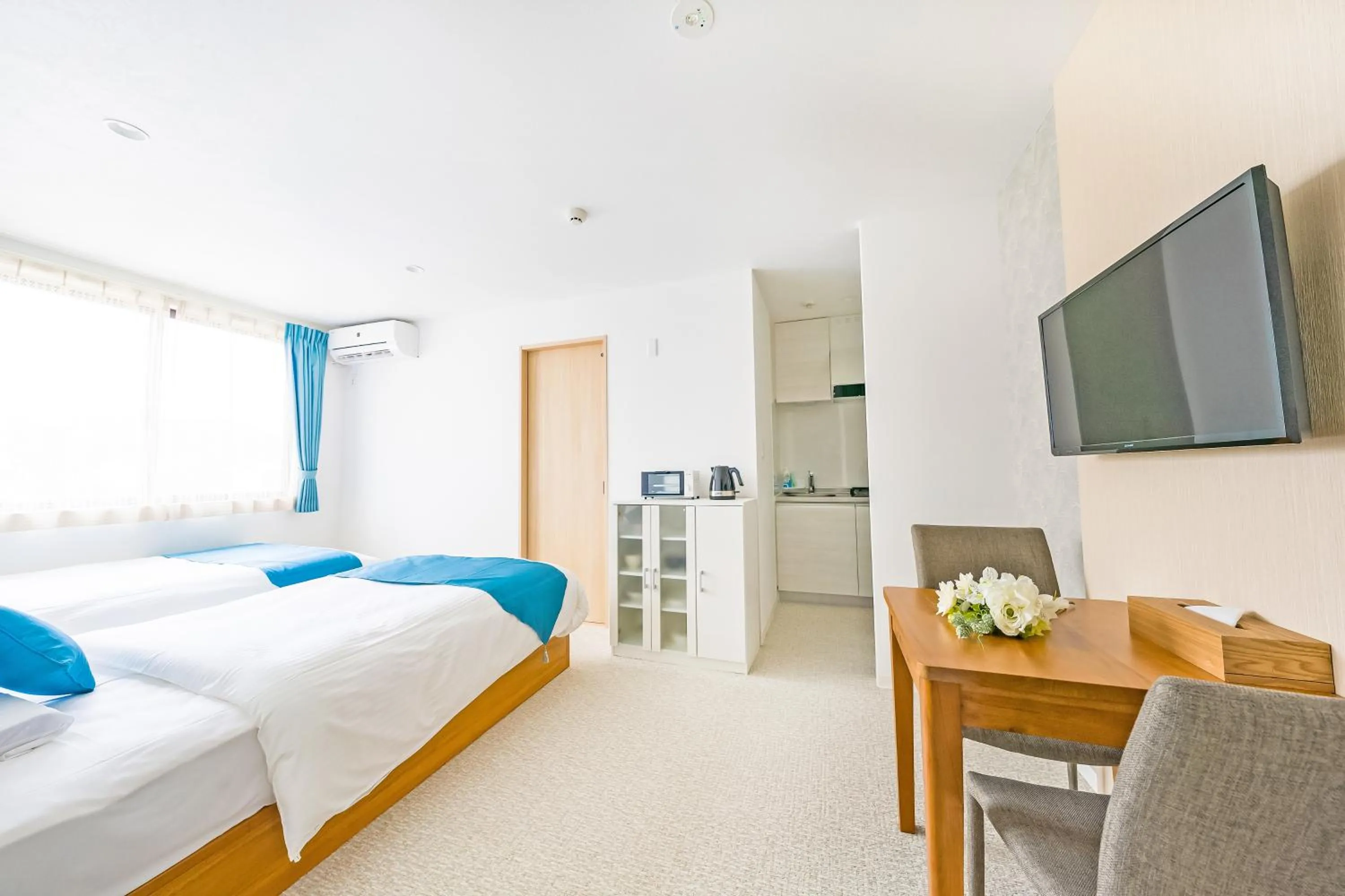 Bedroom, Bed in Hotel California Miyakojima Resort