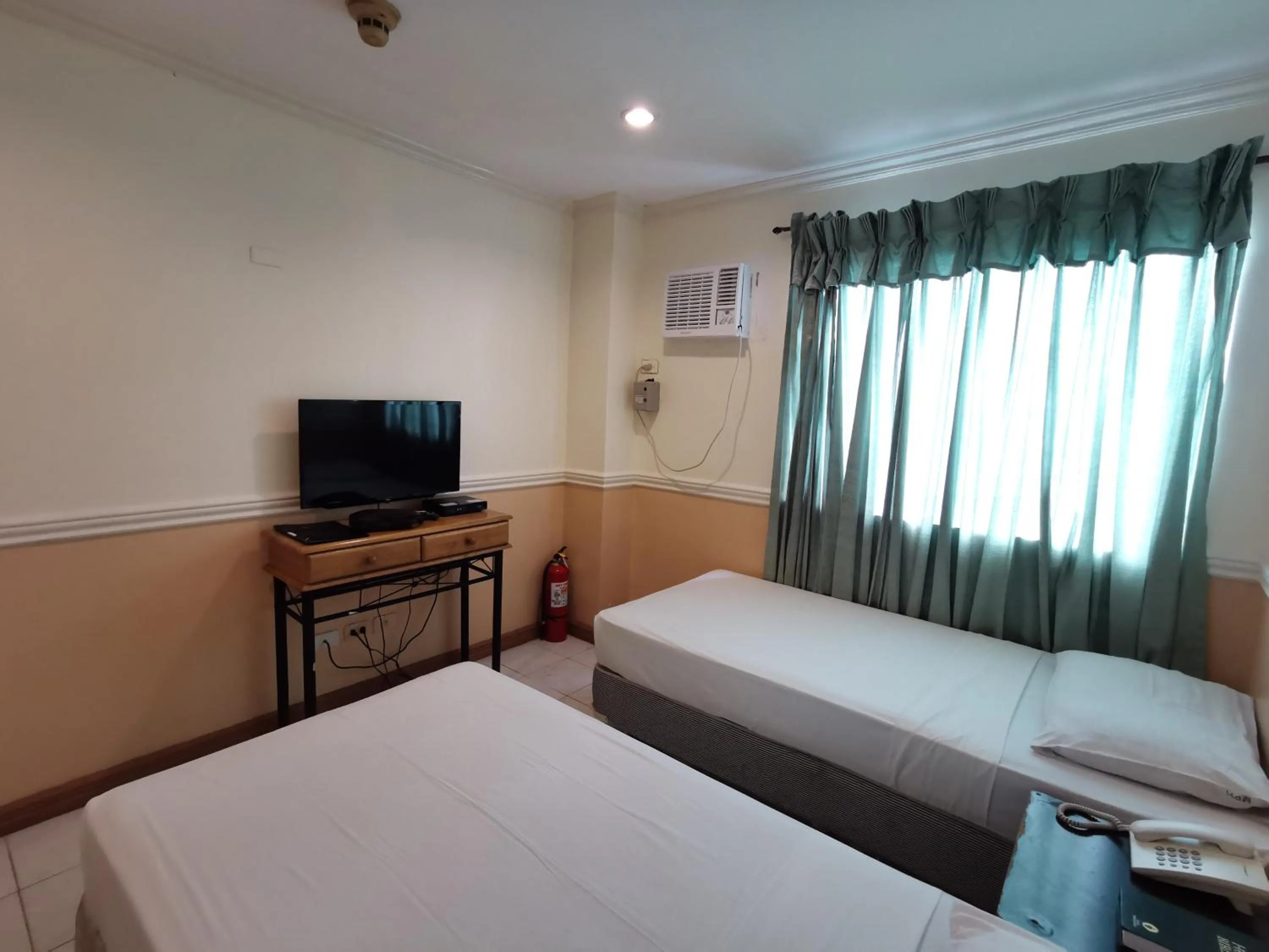 Bed in Metro Park Hotel - Cebu City