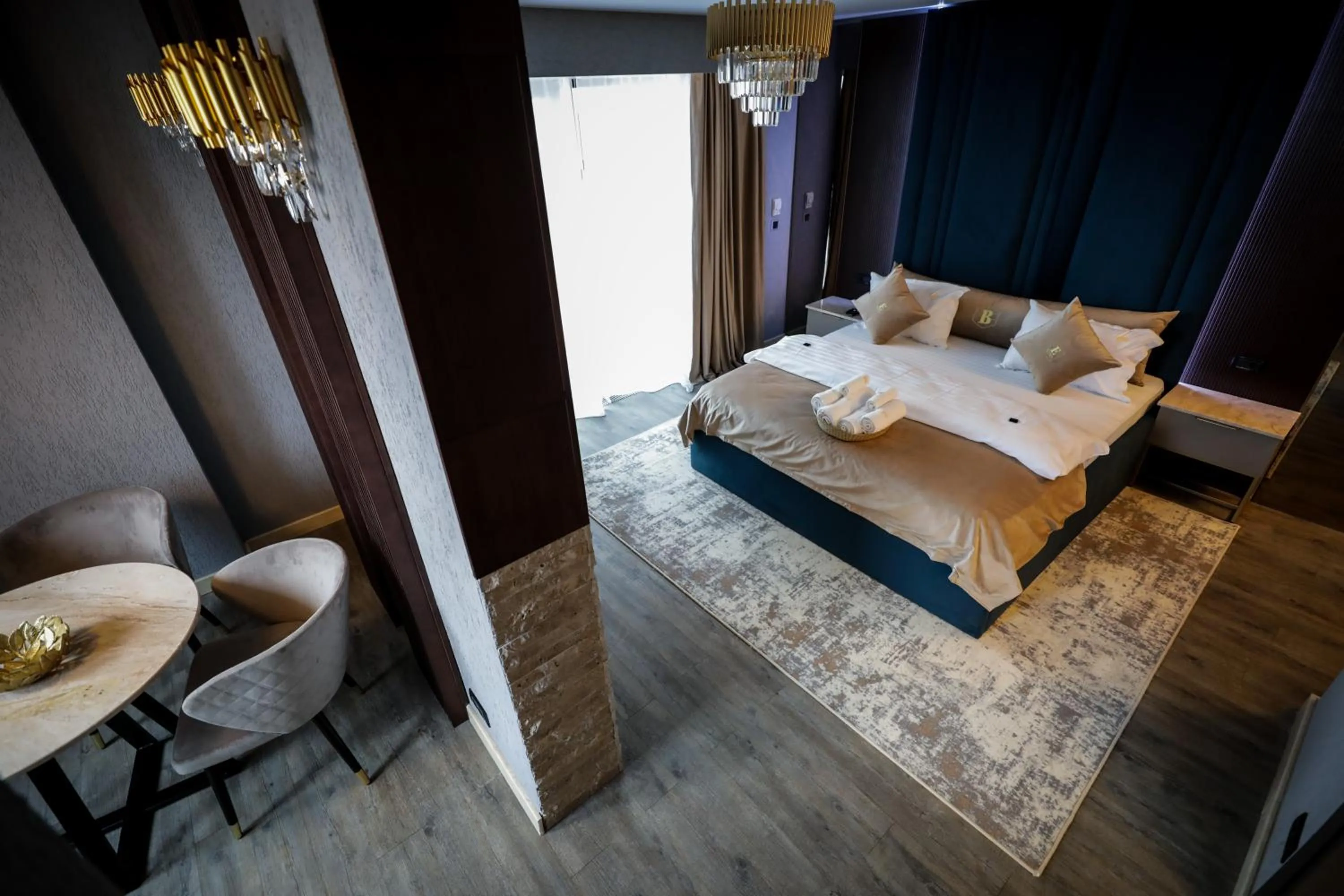 Bed in Elexus Apartments Poiana Brasov