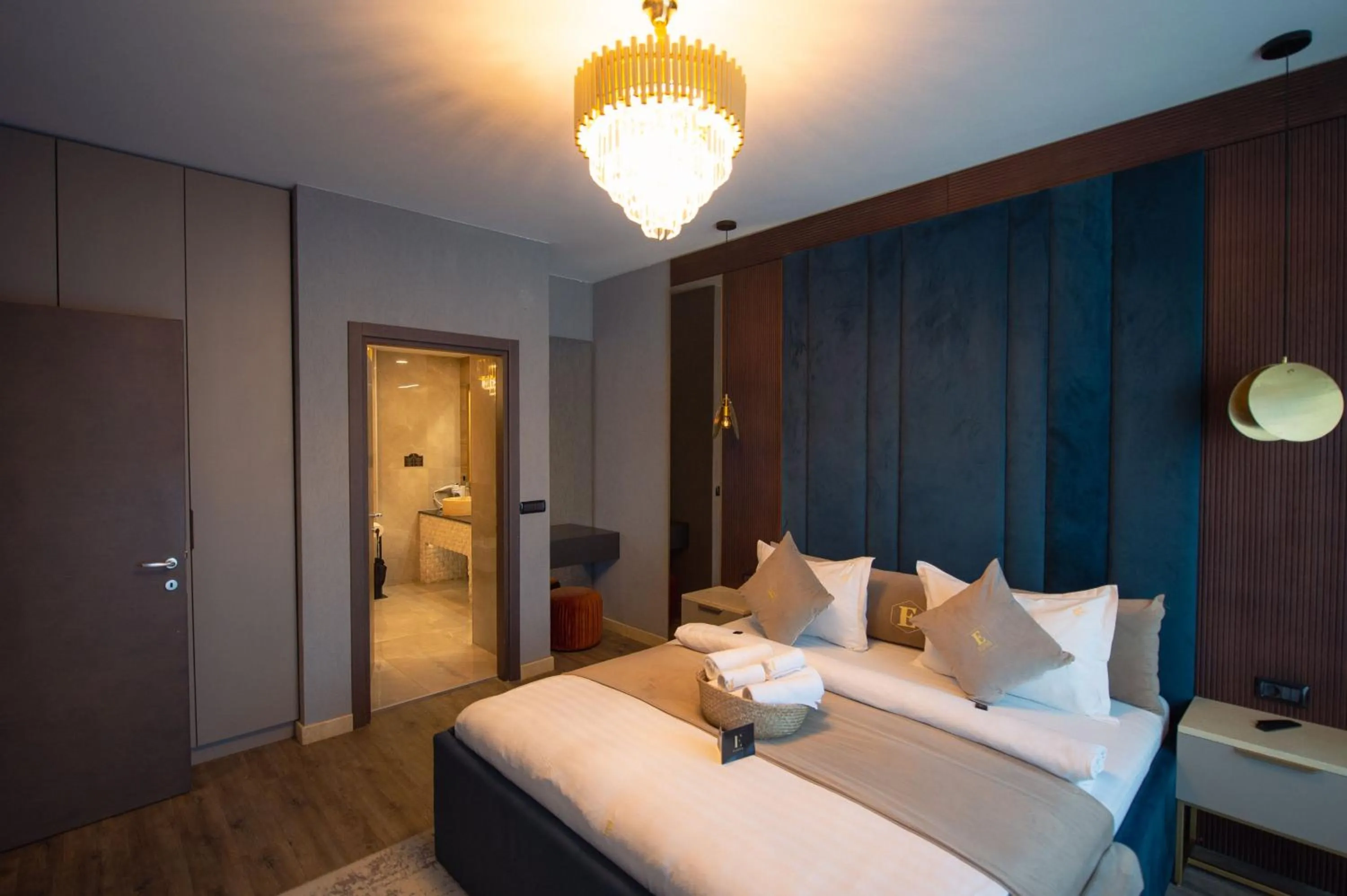 Bed in Elexus Apartments Poiana Brasov