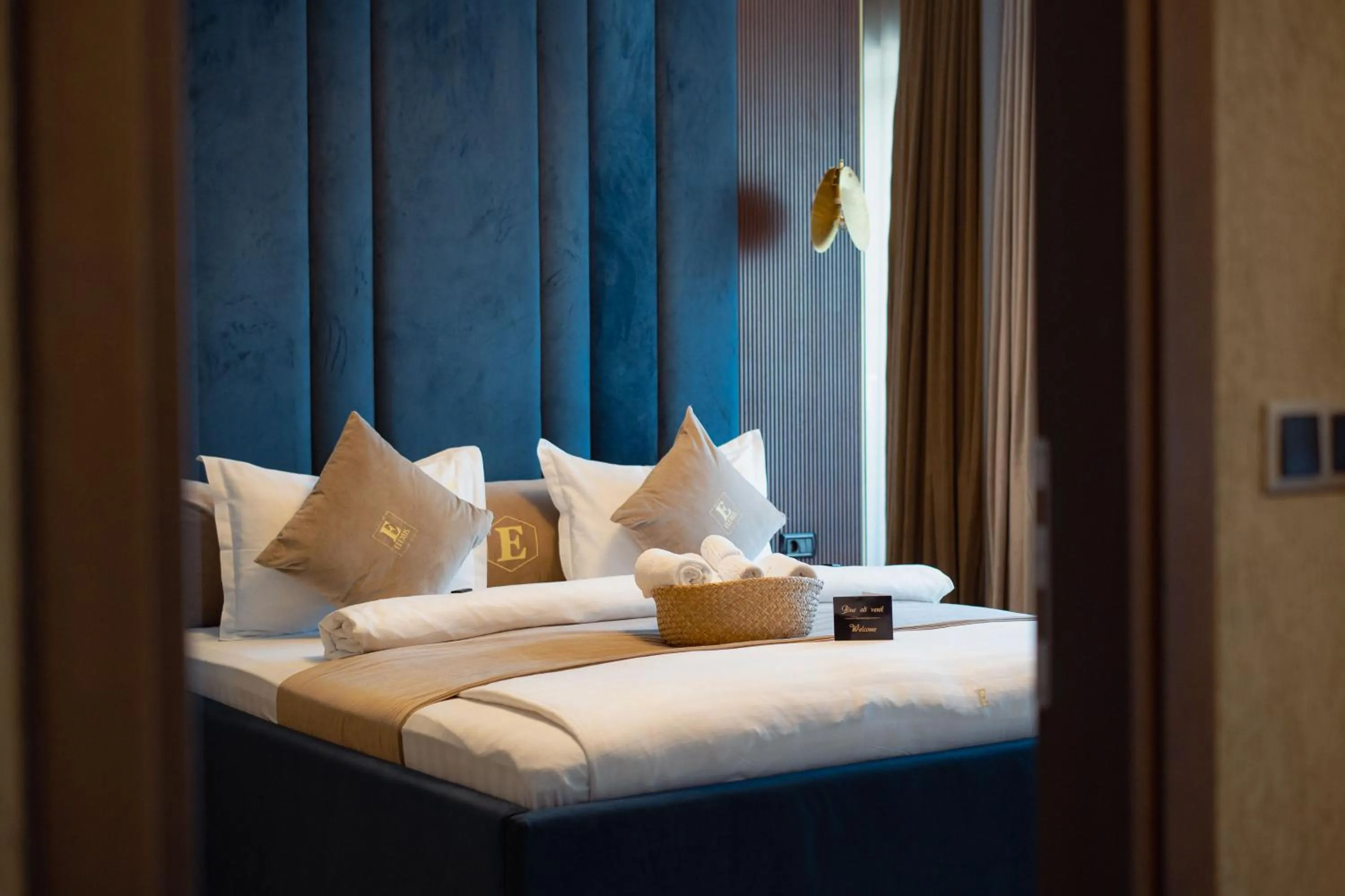 Bed in Elexus Apartments Poiana Brasov