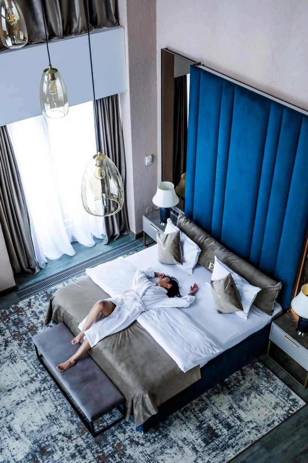 Bed in Elexus Apartments Poiana Brasov