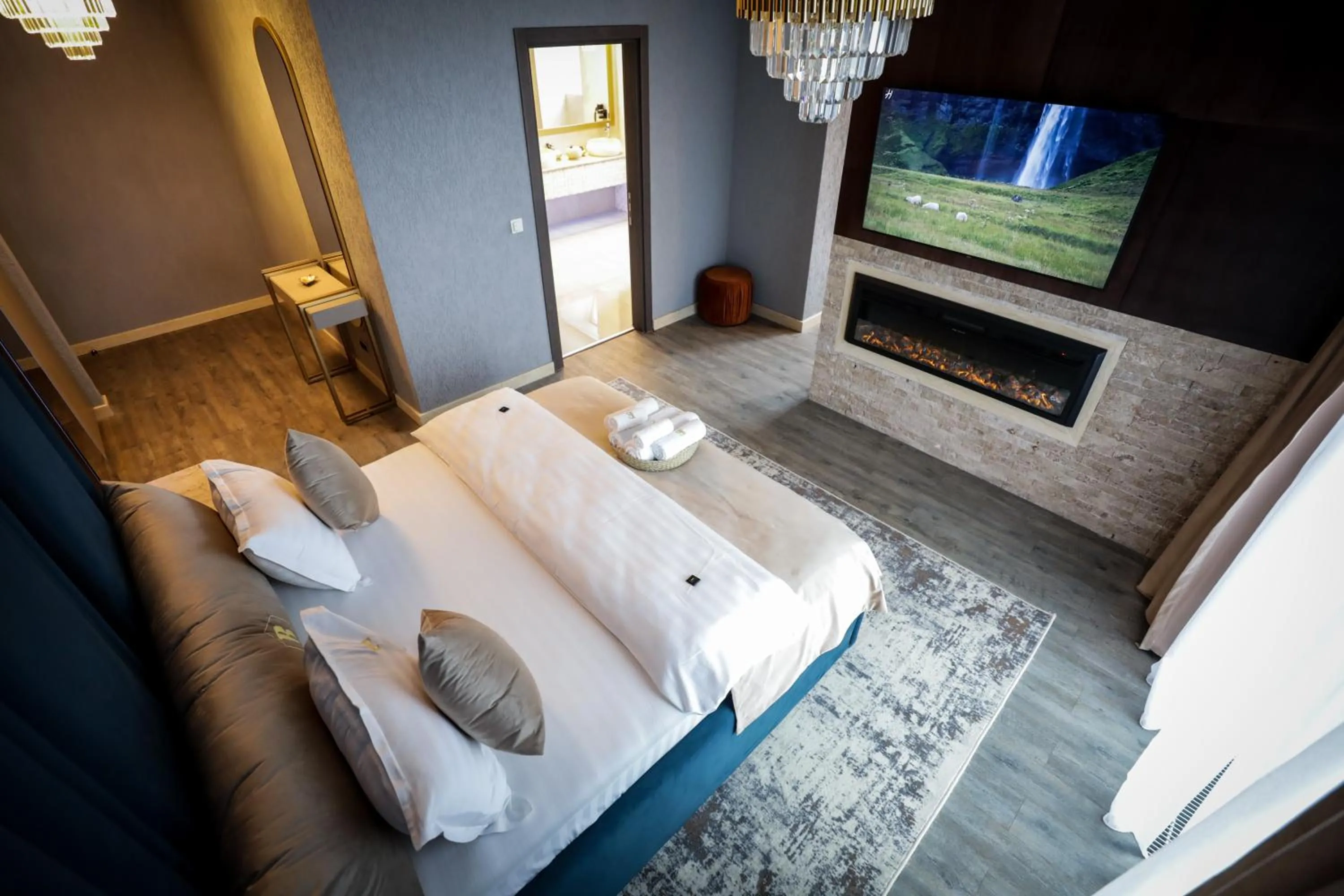 Bed in Elexus Apartments Poiana Brasov