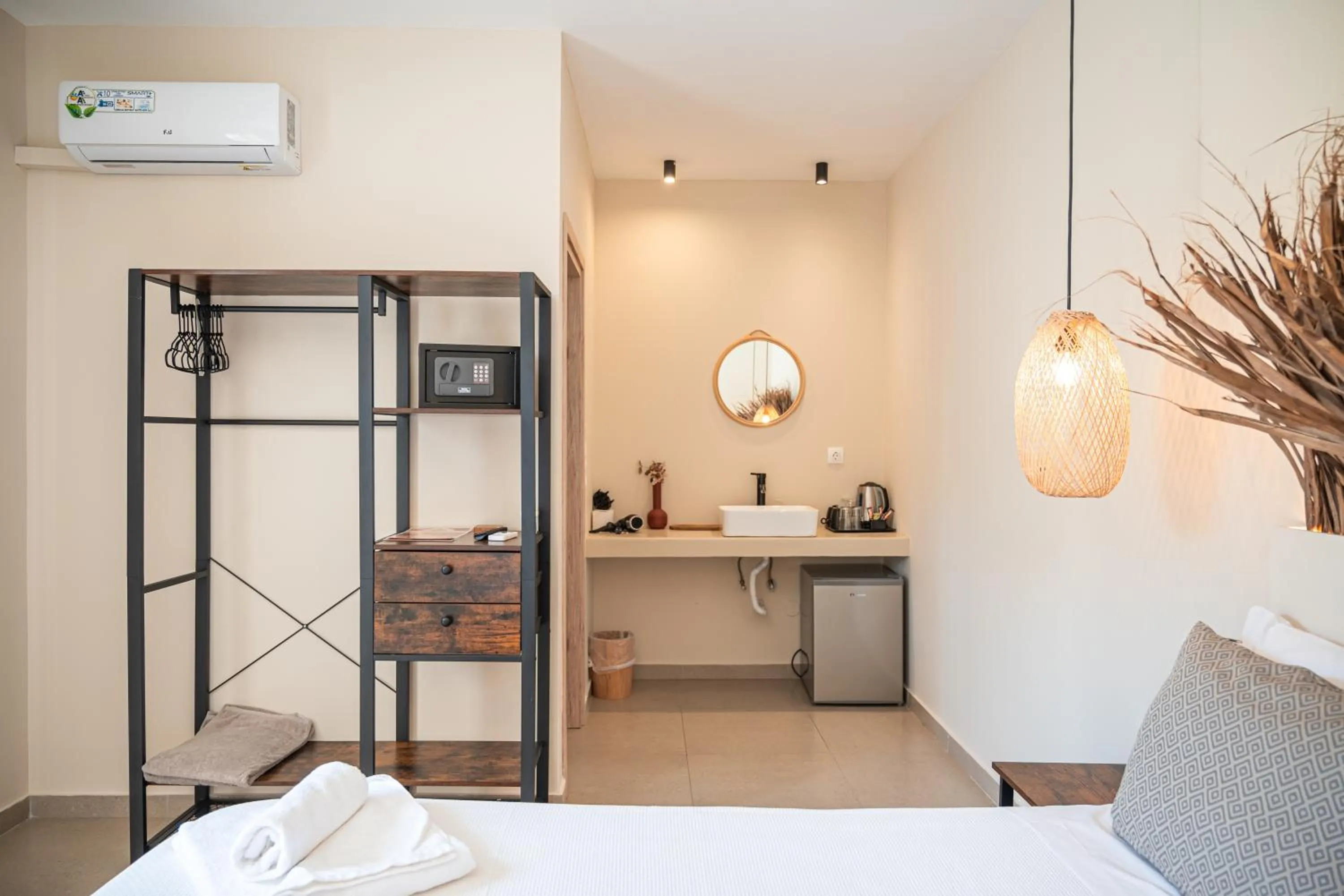 Bed in Atma Beach Rooms & Suites