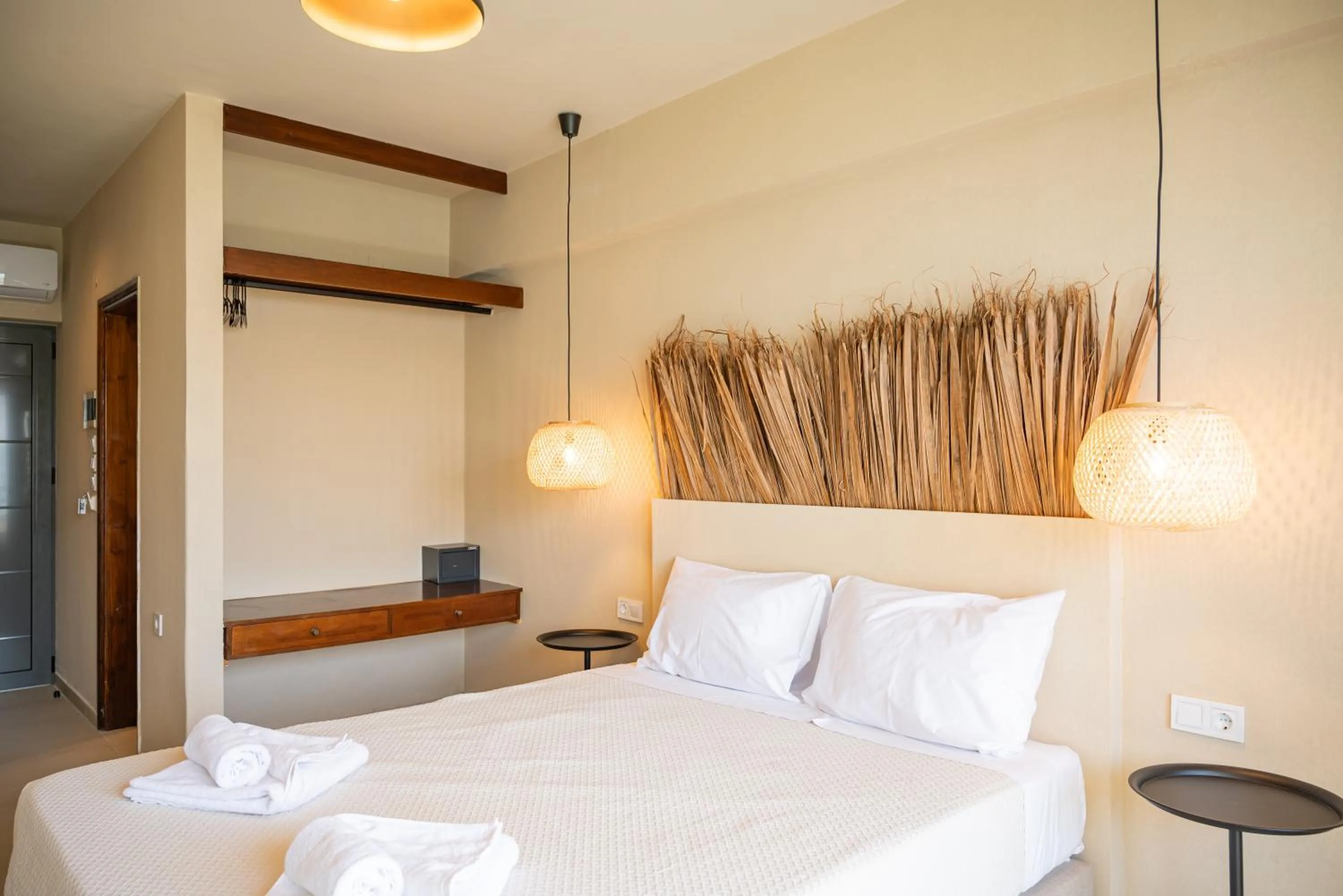 Bed in Atma Beach Rooms & Suites