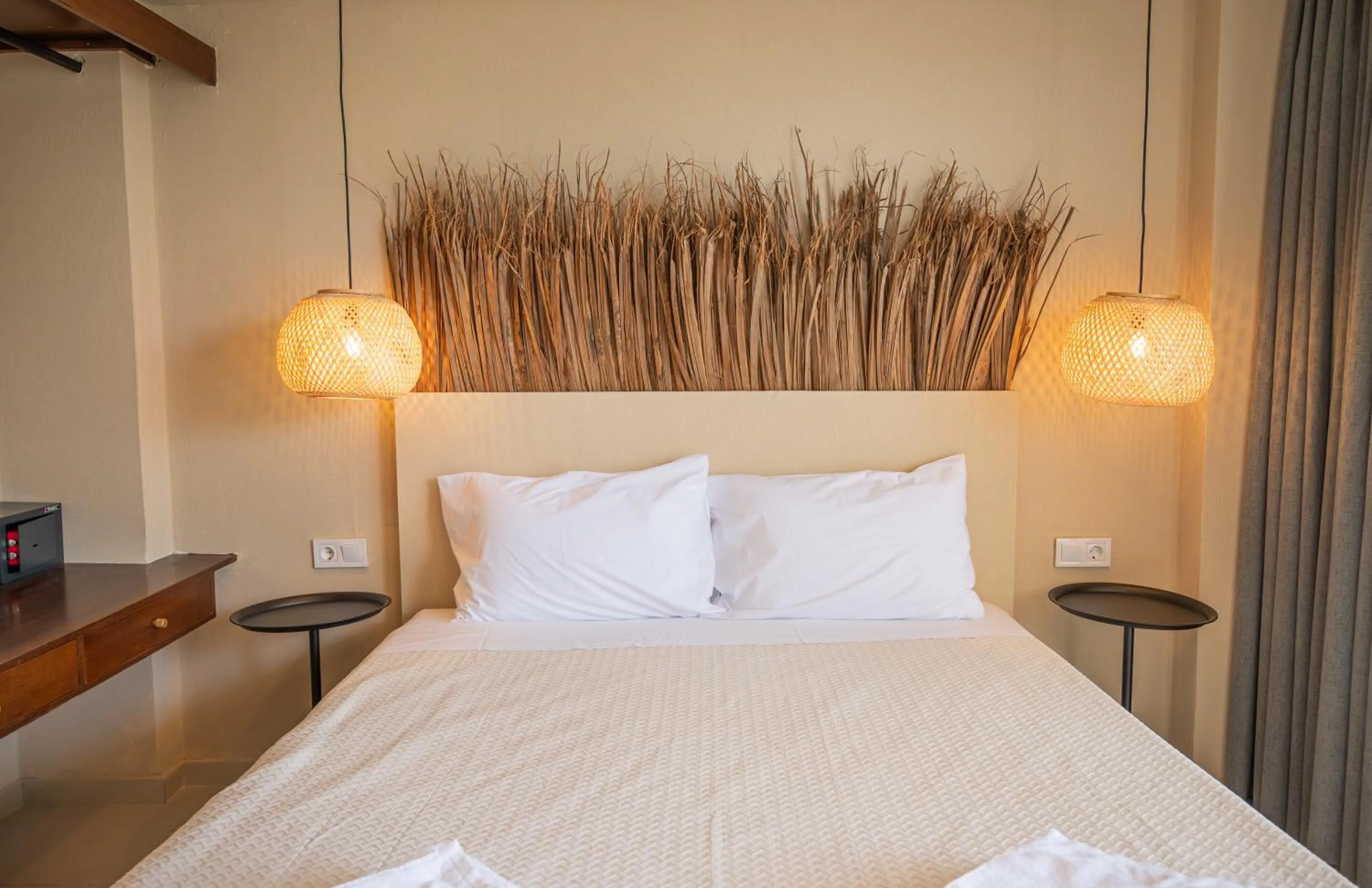 Bed in Atma Beach Rooms & Suites