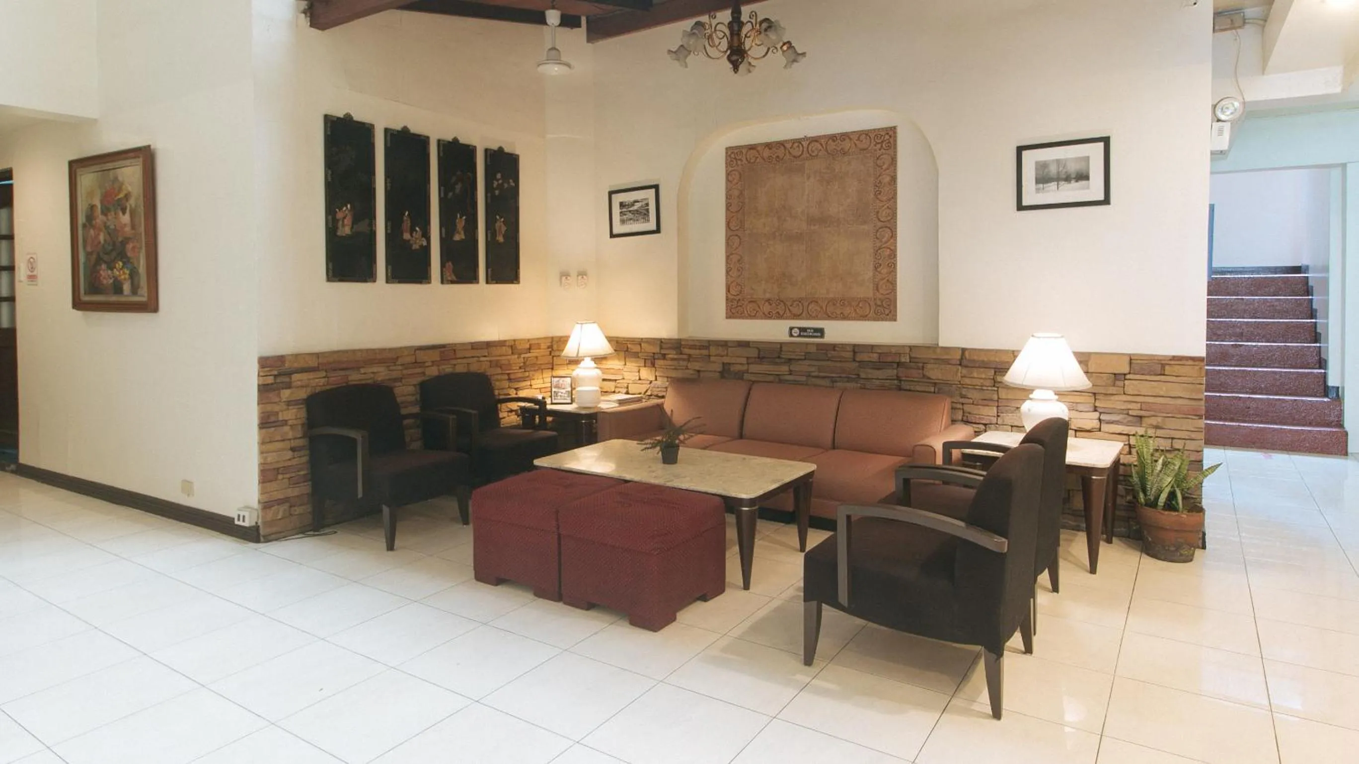 Lobby or reception in El Rico Suite Makati by RedDoorz