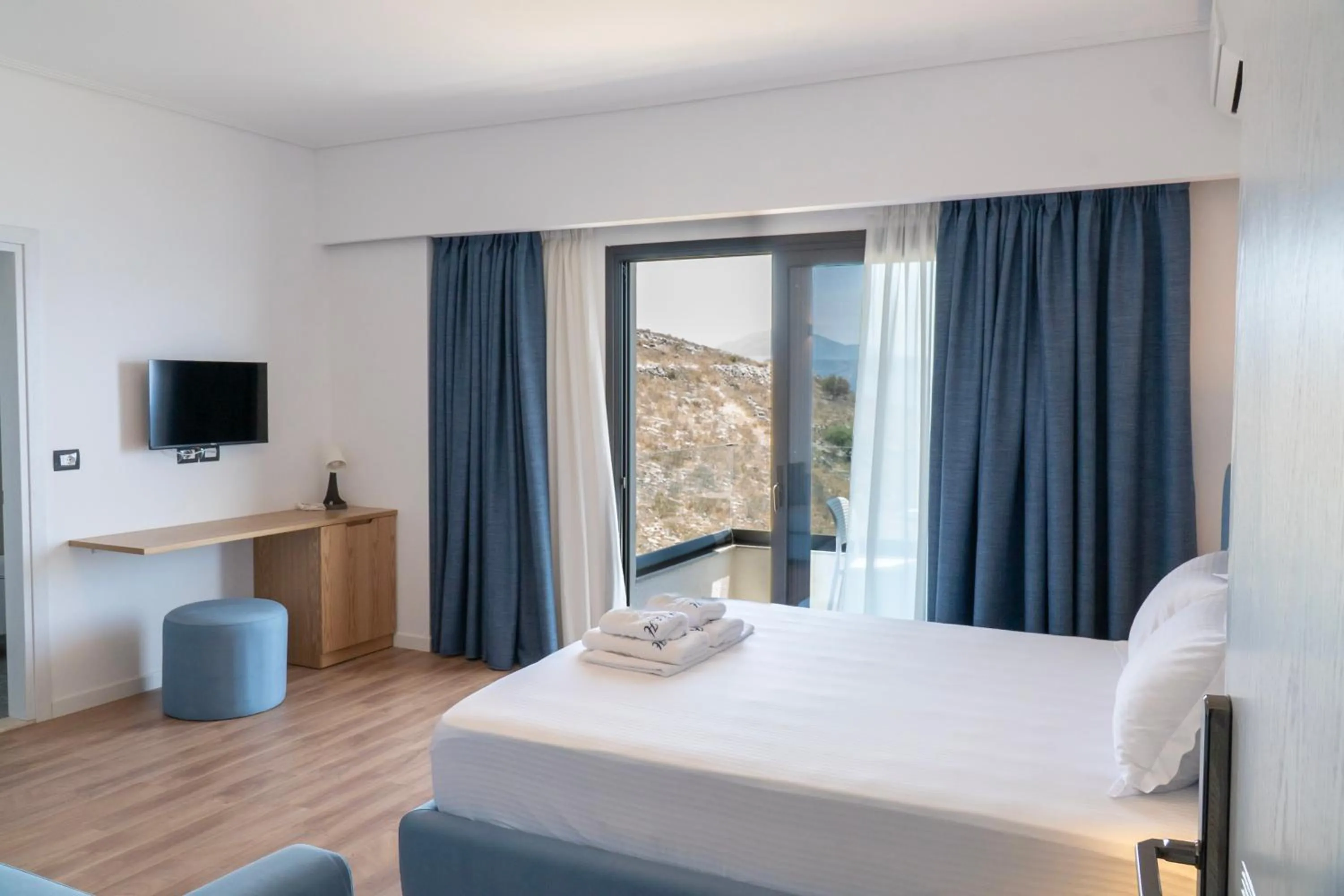 Bed in Hilltop Heaven Hotel