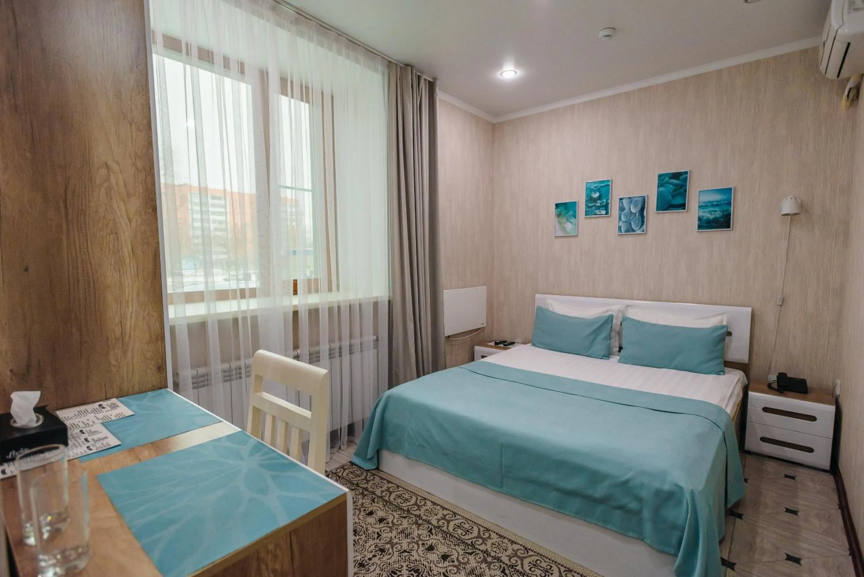 Bed in Altyn Adam Hotel