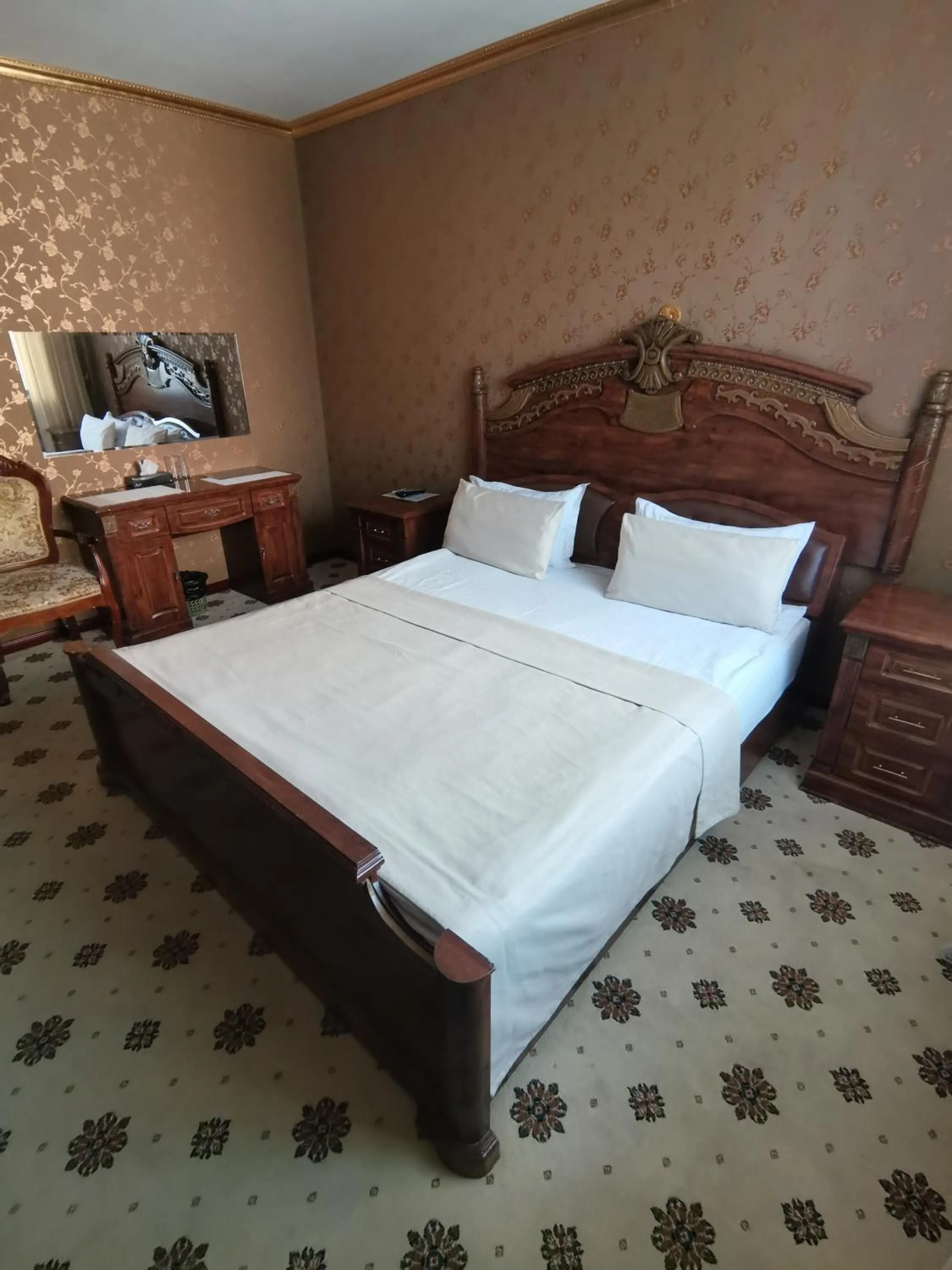 Bed in Altyn Adam Hotel