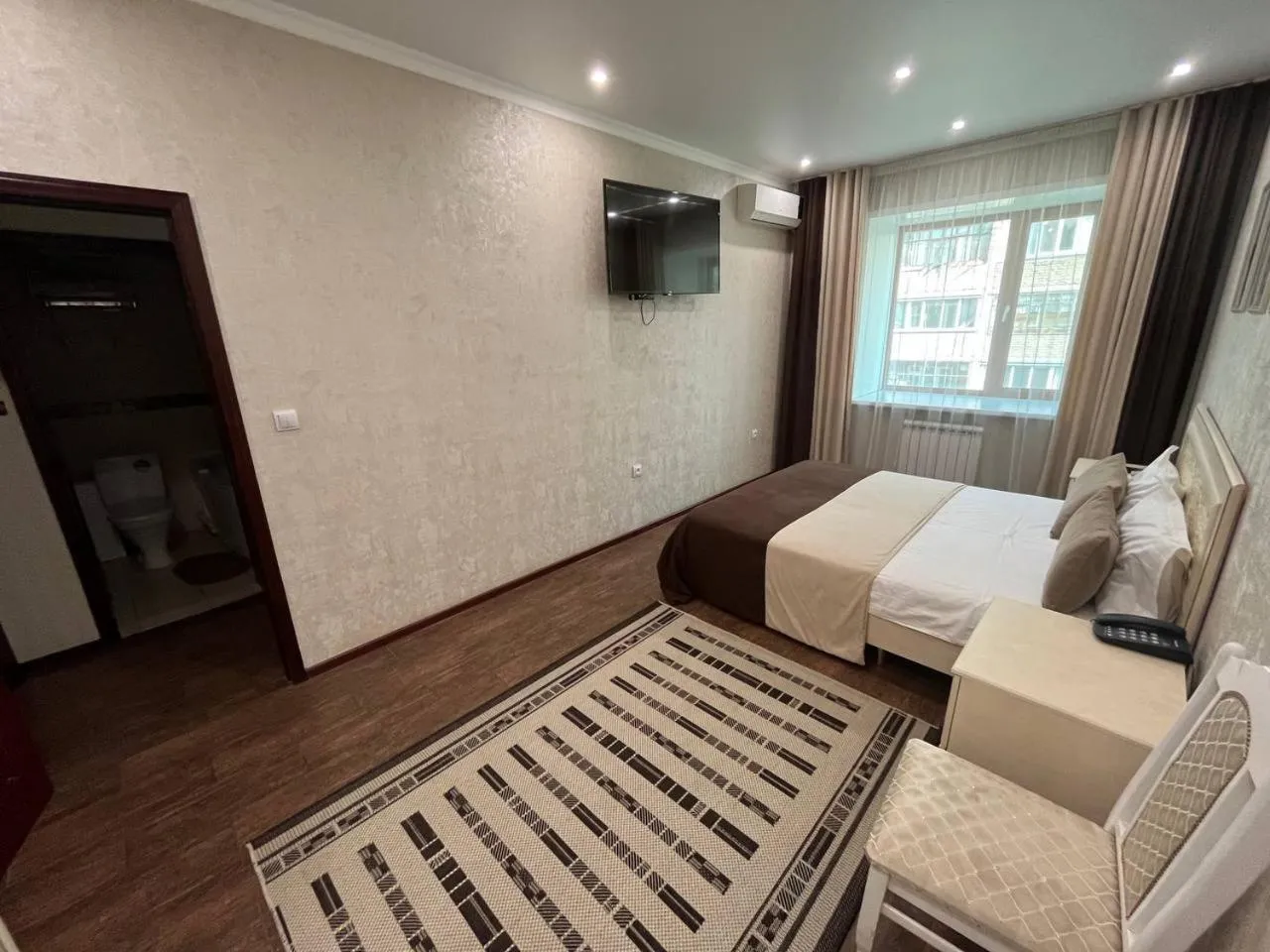 Bed in Altyn Adam Hotel