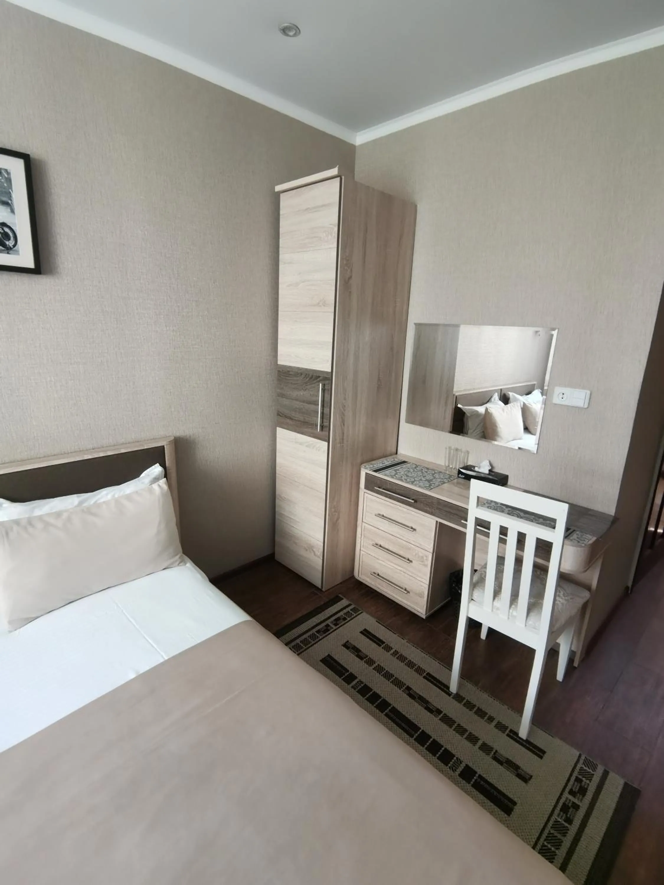 Bed in Altyn Adam Hotel