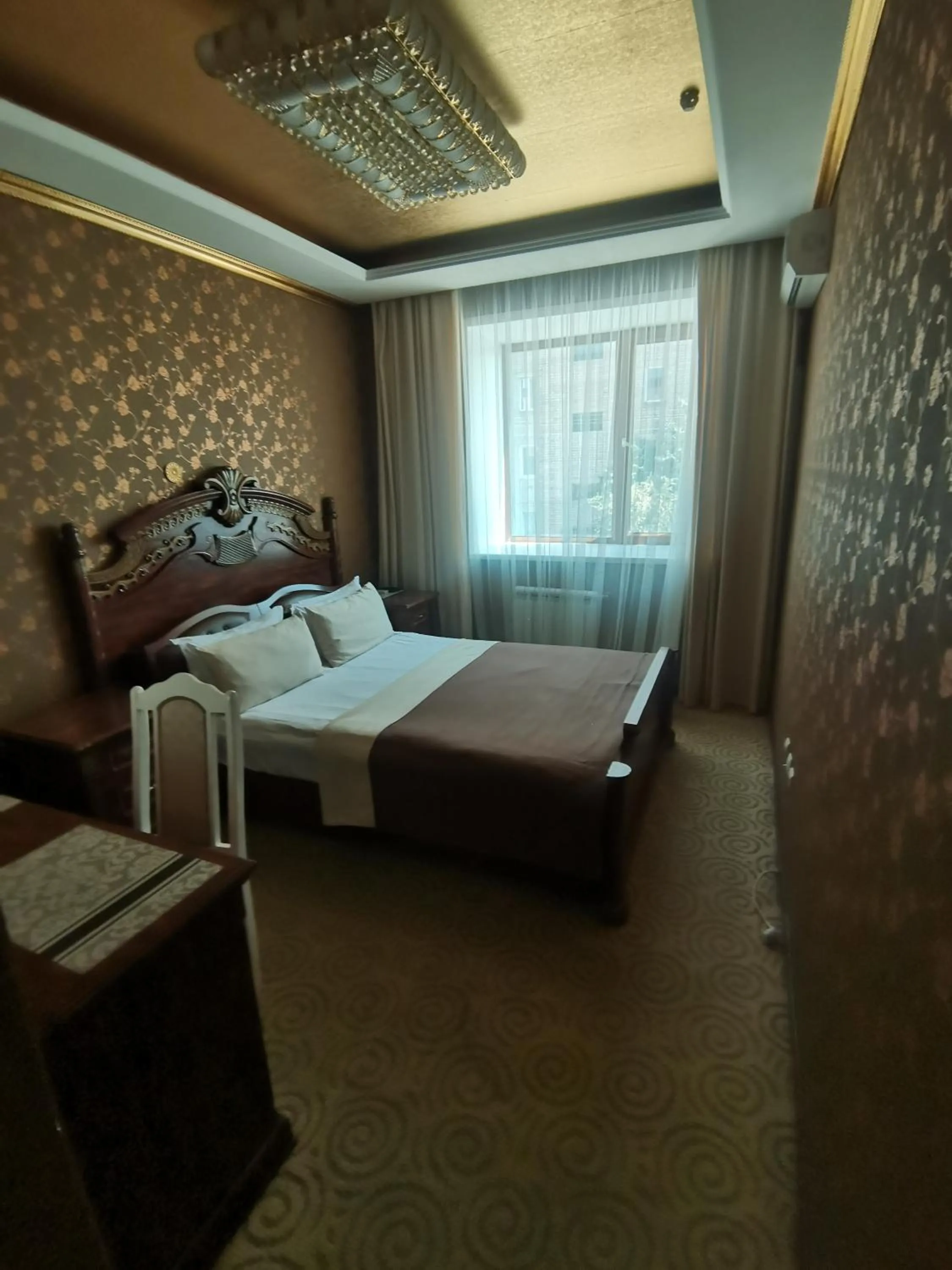 Bed in Altyn Adam Hotel