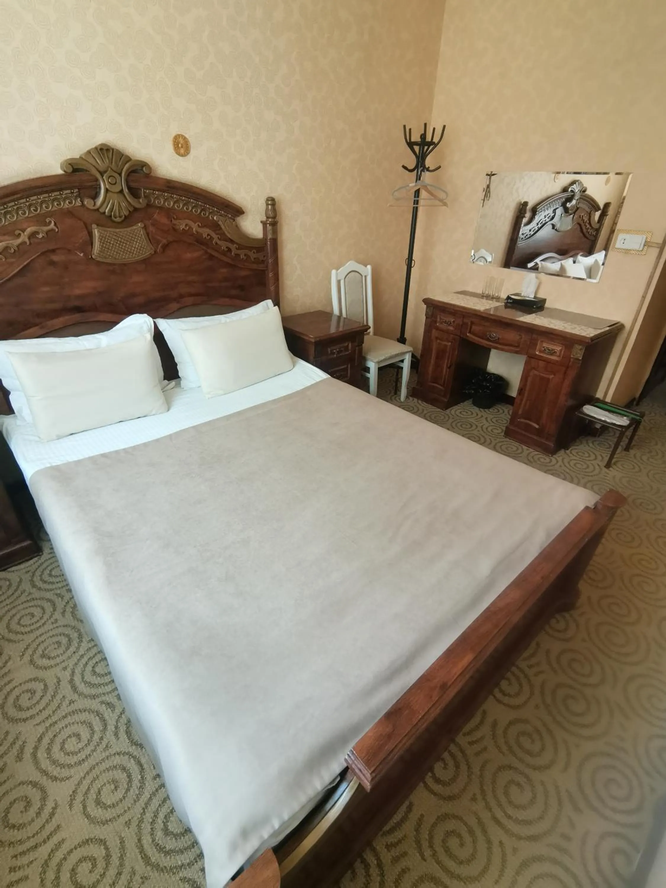 Bed in Altyn Adam Hotel