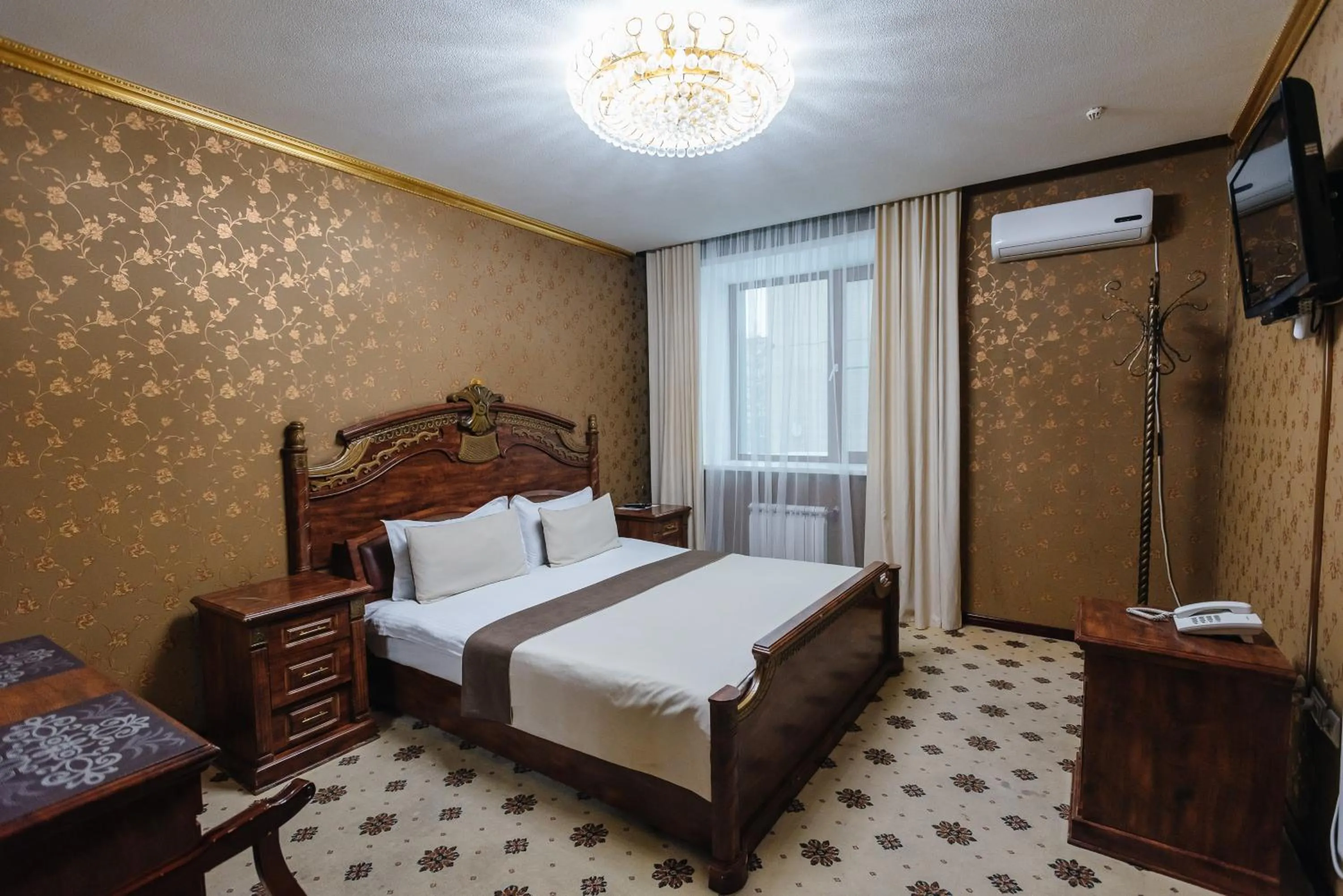 Bed in Altyn Adam Hotel