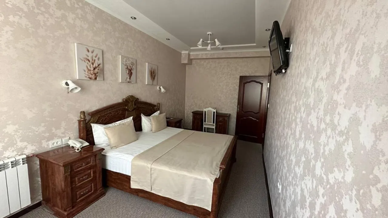 Bed in Altyn Adam Hotel