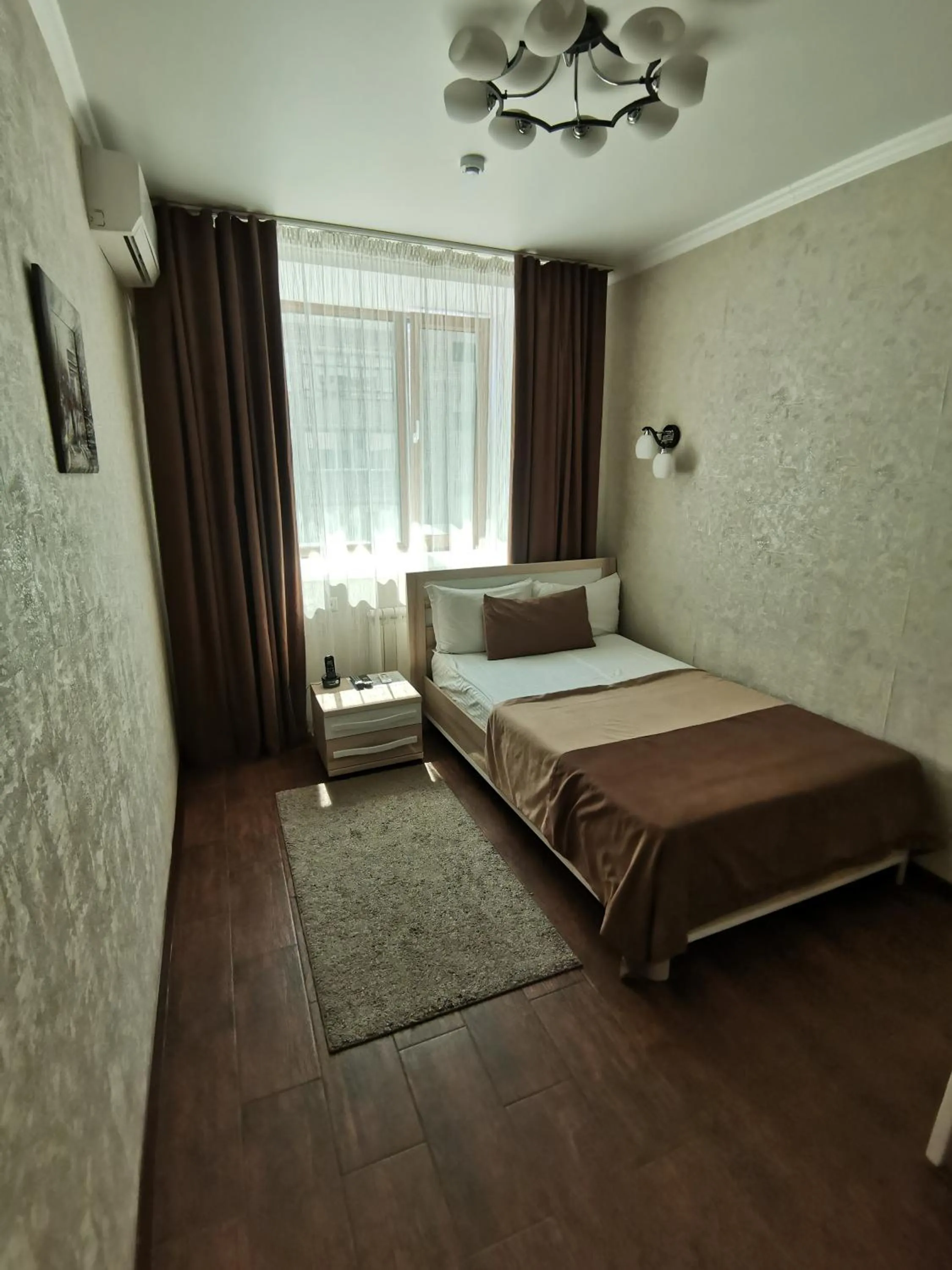 Bed in Altyn Adam Hotel