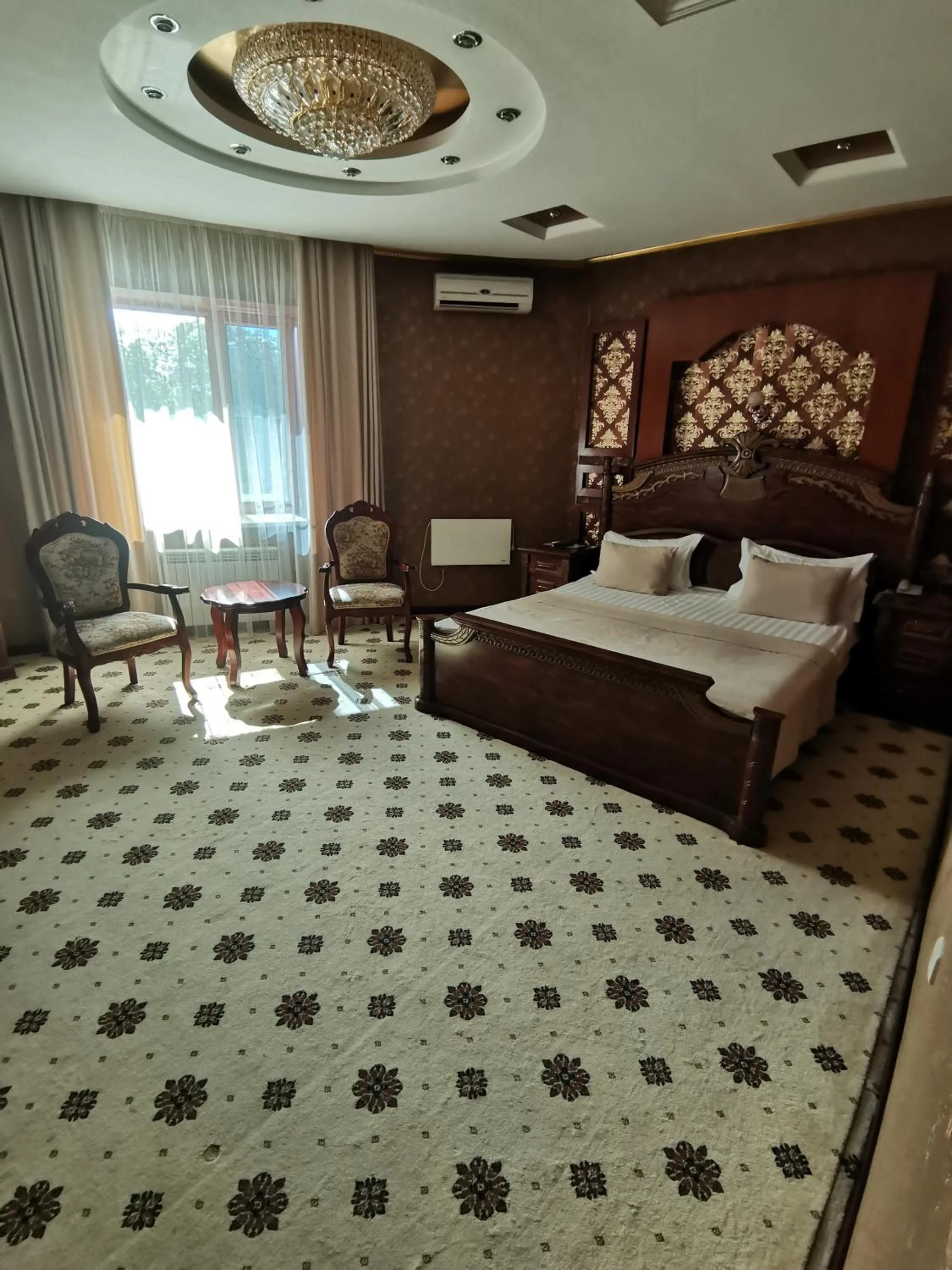 Bed in Altyn Adam Hotel