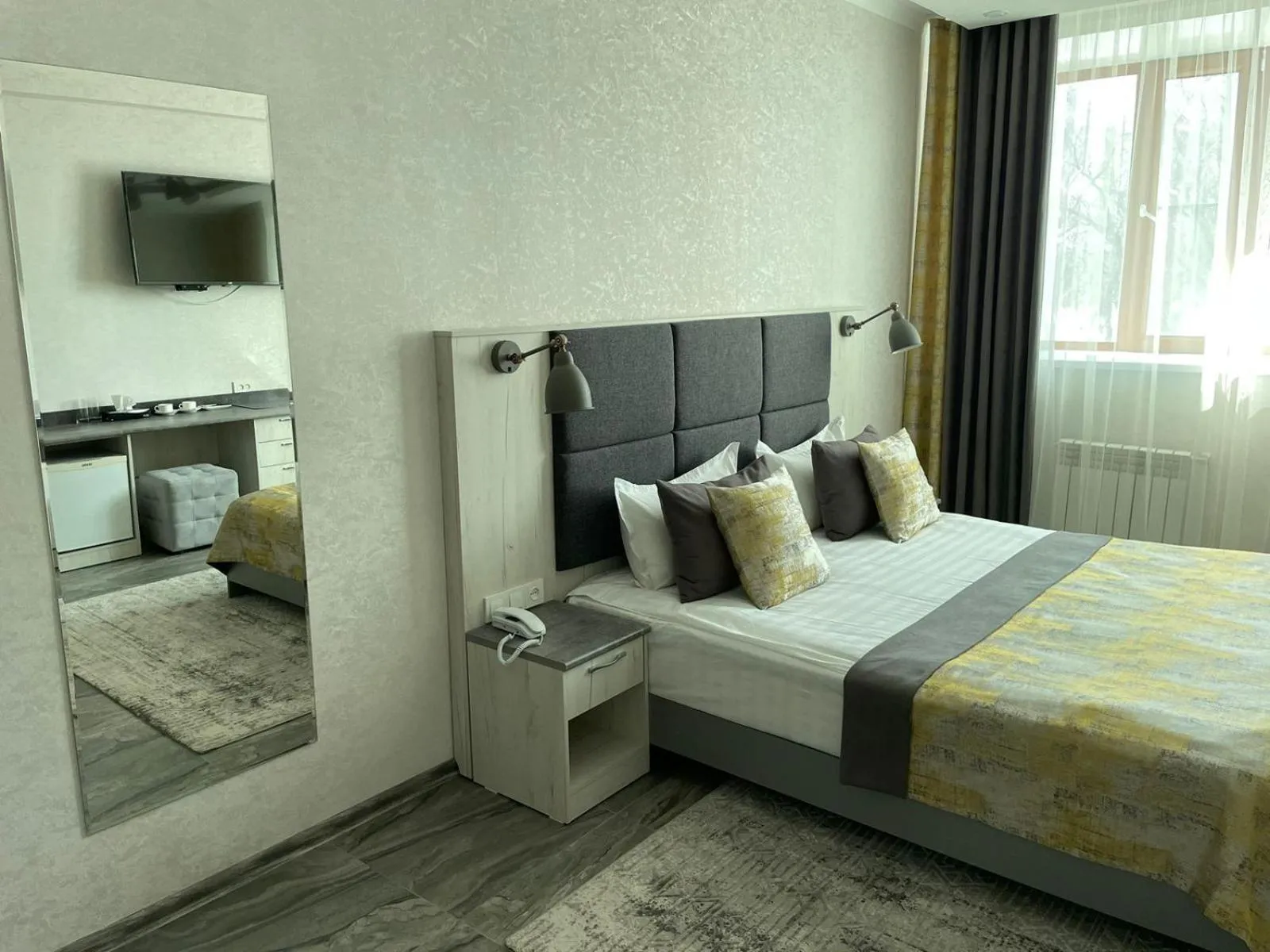 Bed in Altyn Adam Hotel