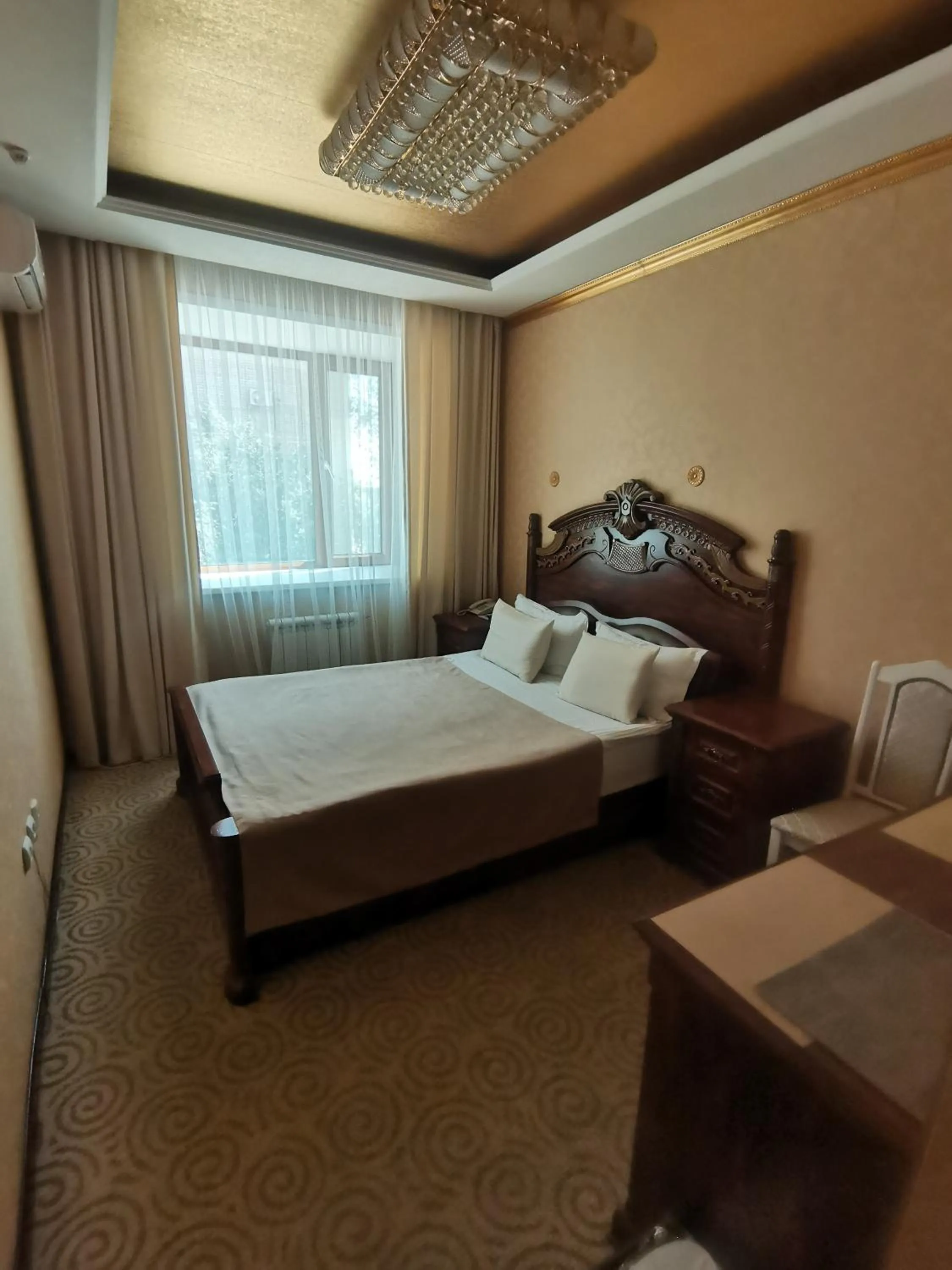 Bed in Altyn Adam Hotel