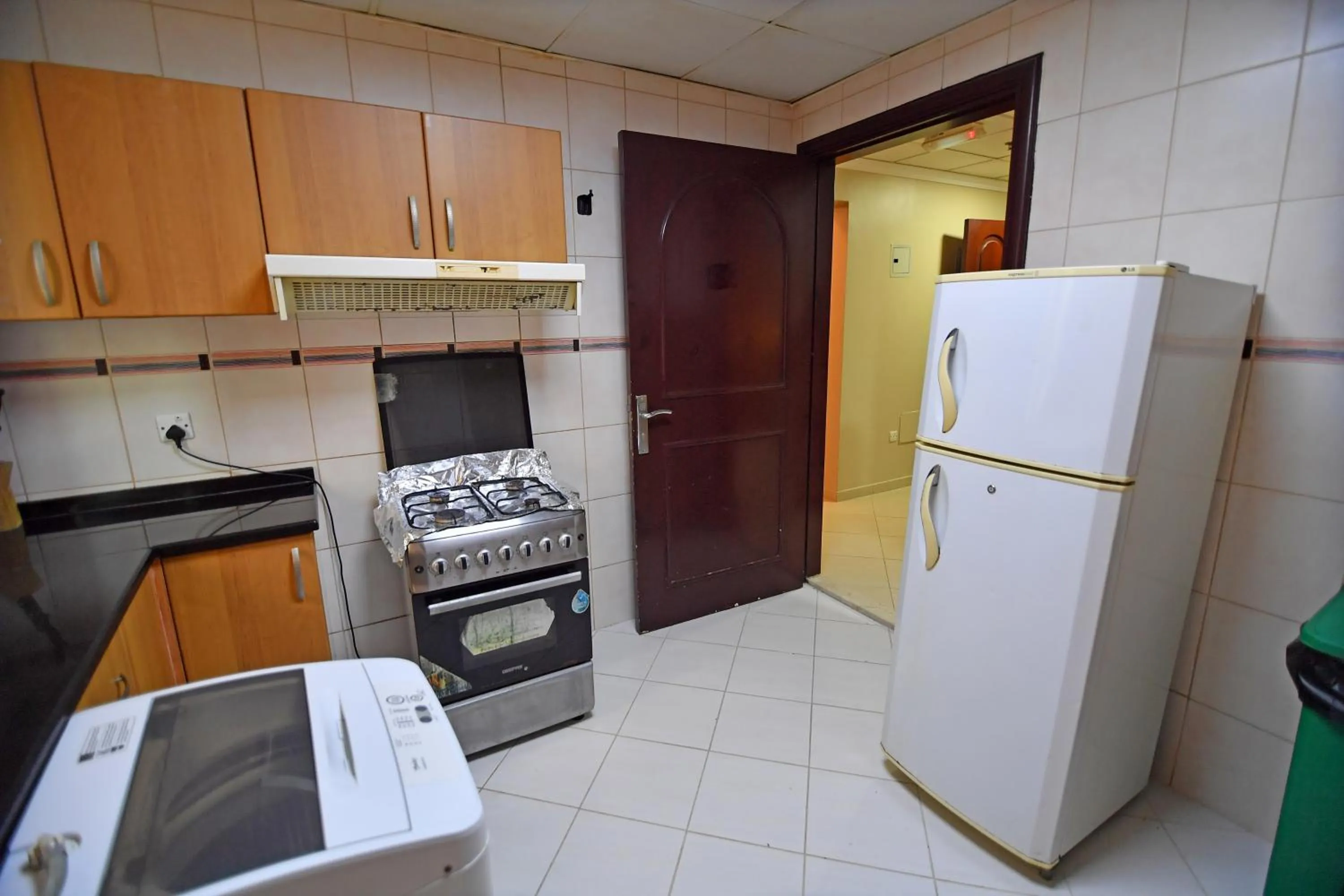 Kitchen or kitchenette in Emirates Stars Hotel Apartments Sharjah
