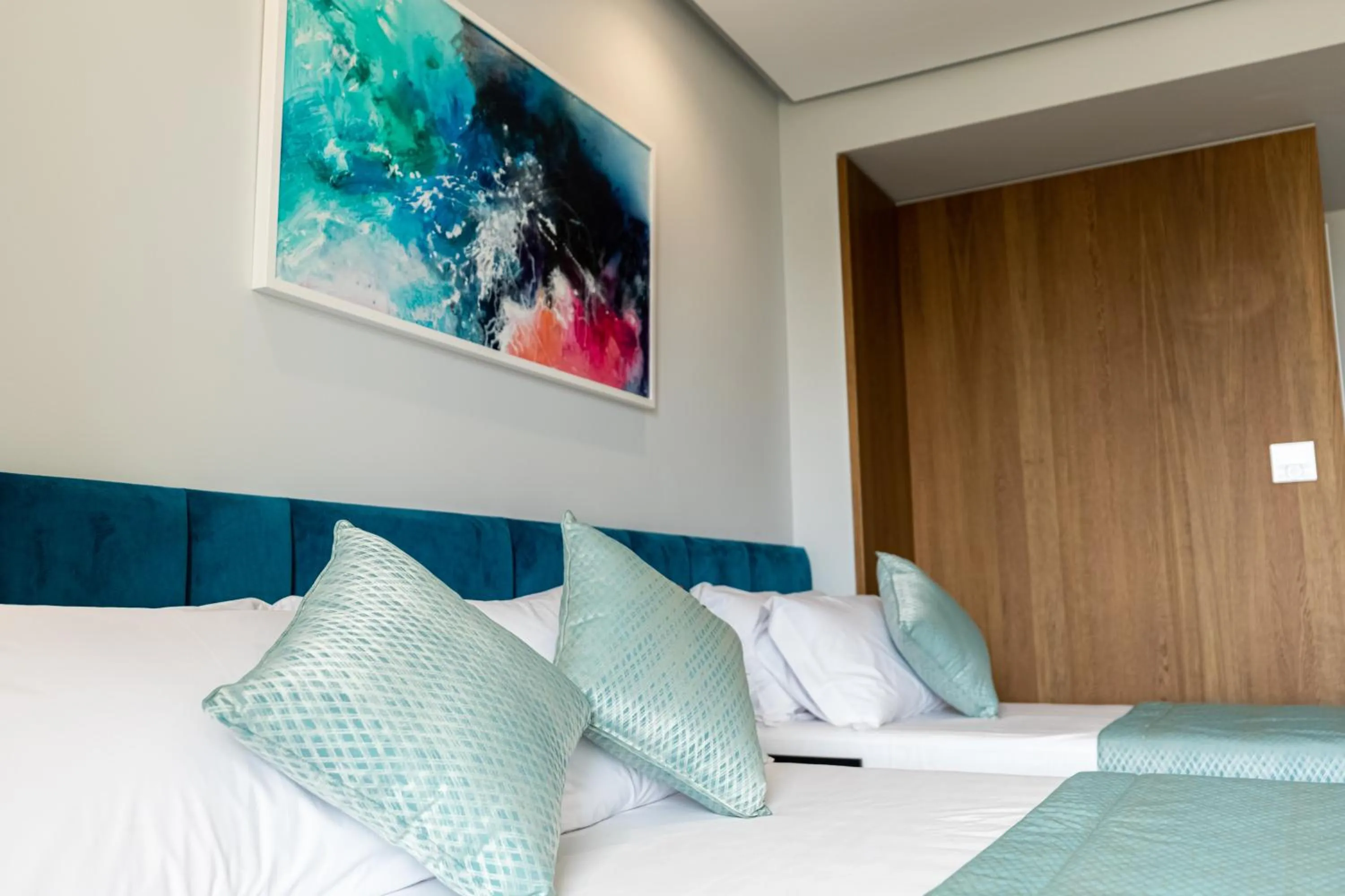 Bed in Ames Hotel & SPA