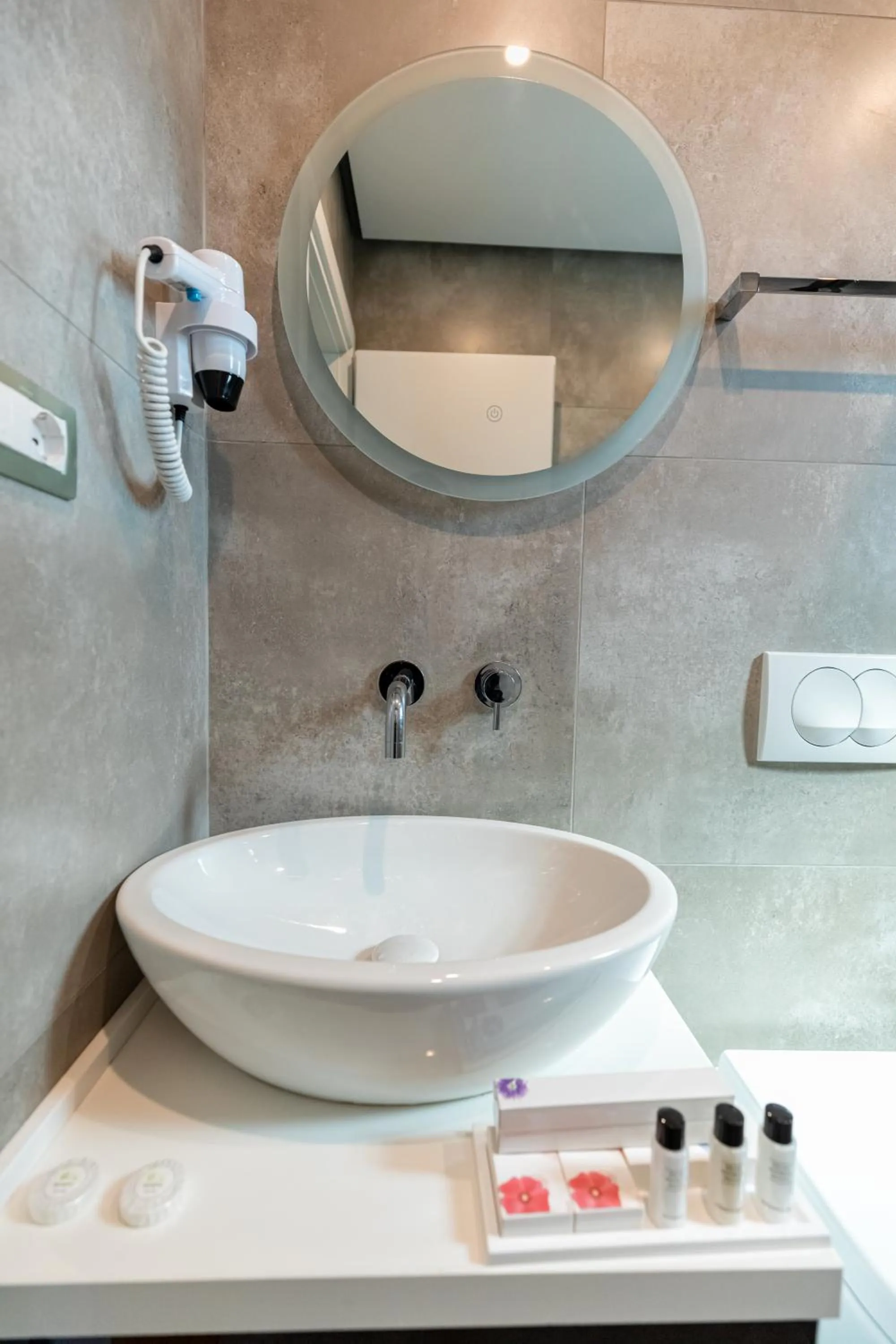 Bathroom in Ames Hotel & SPA