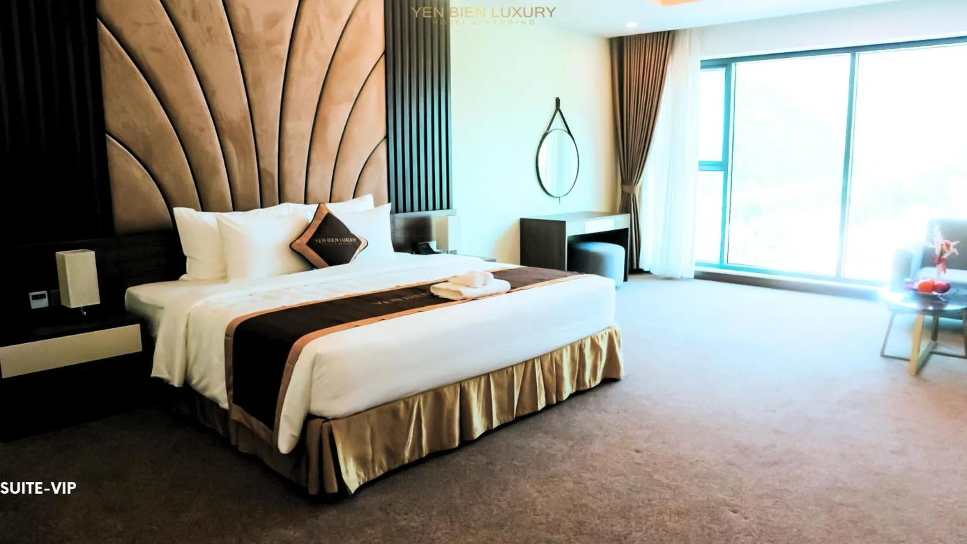 Bed in YEN BIEN LUXURY HOTEL