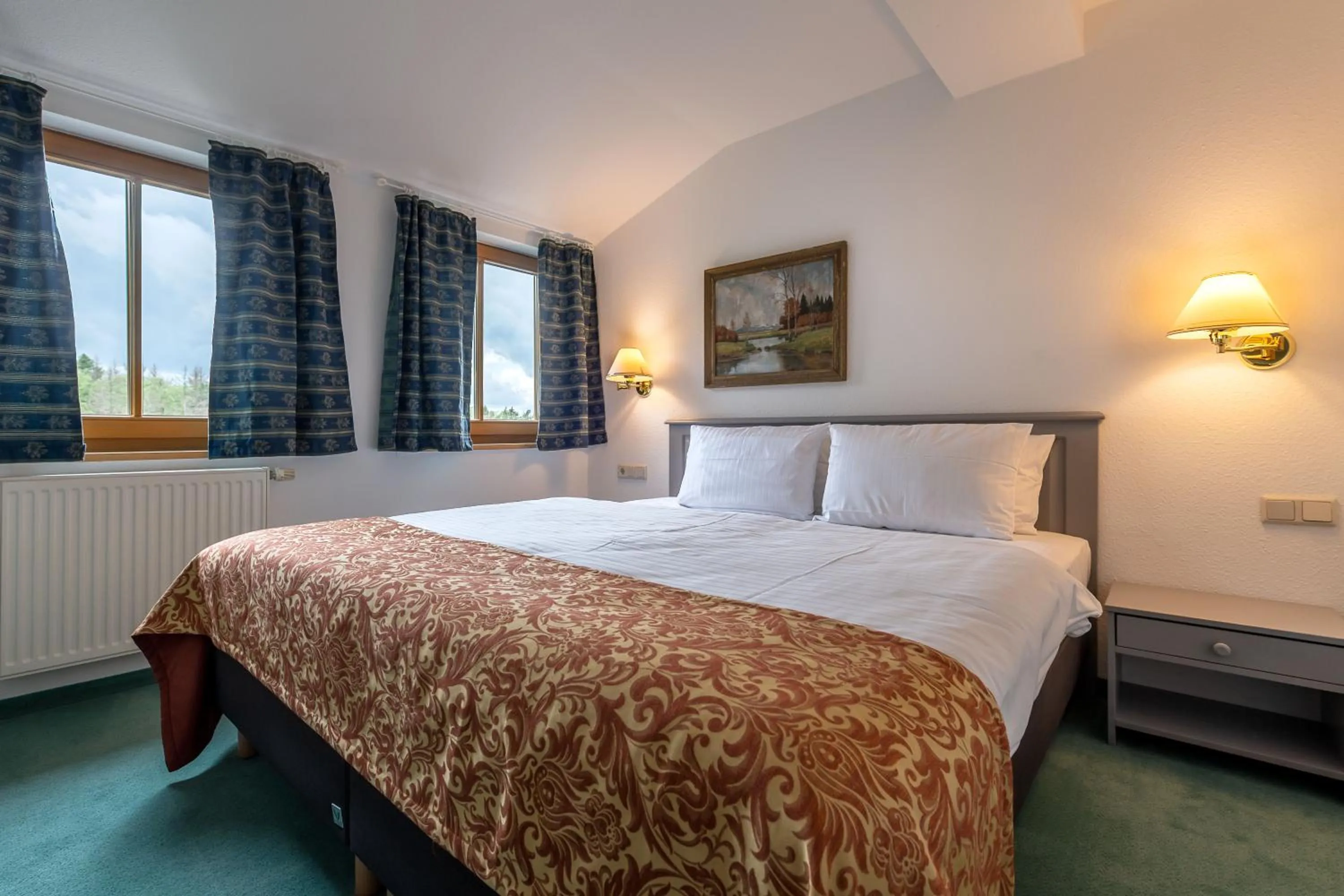 Photo of the whole room, Bed in Parkhotel Hohnstein by STEIGER Hotels