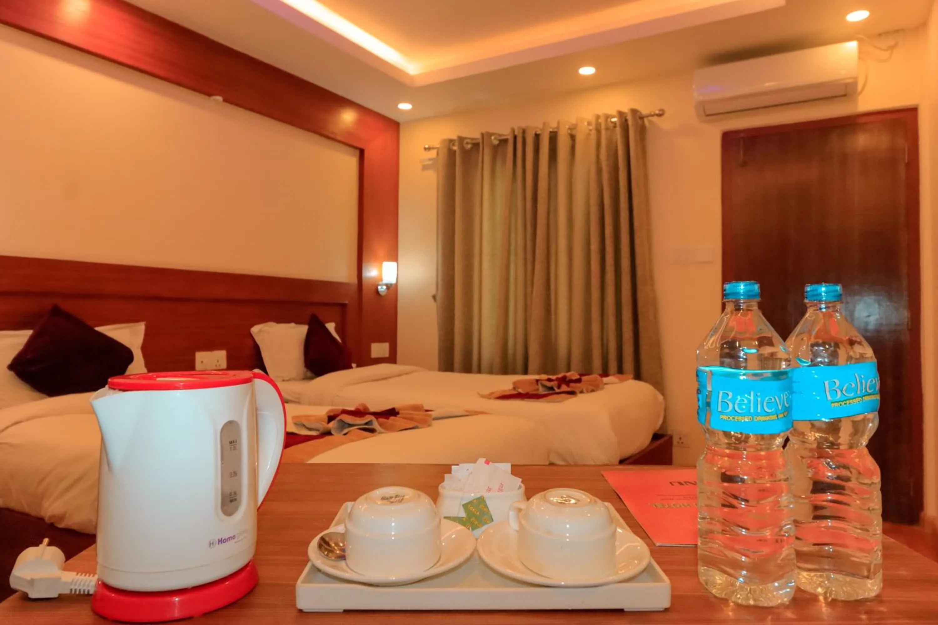Coffee/tea facilities, Bed in Everland Kathmandu Hotel