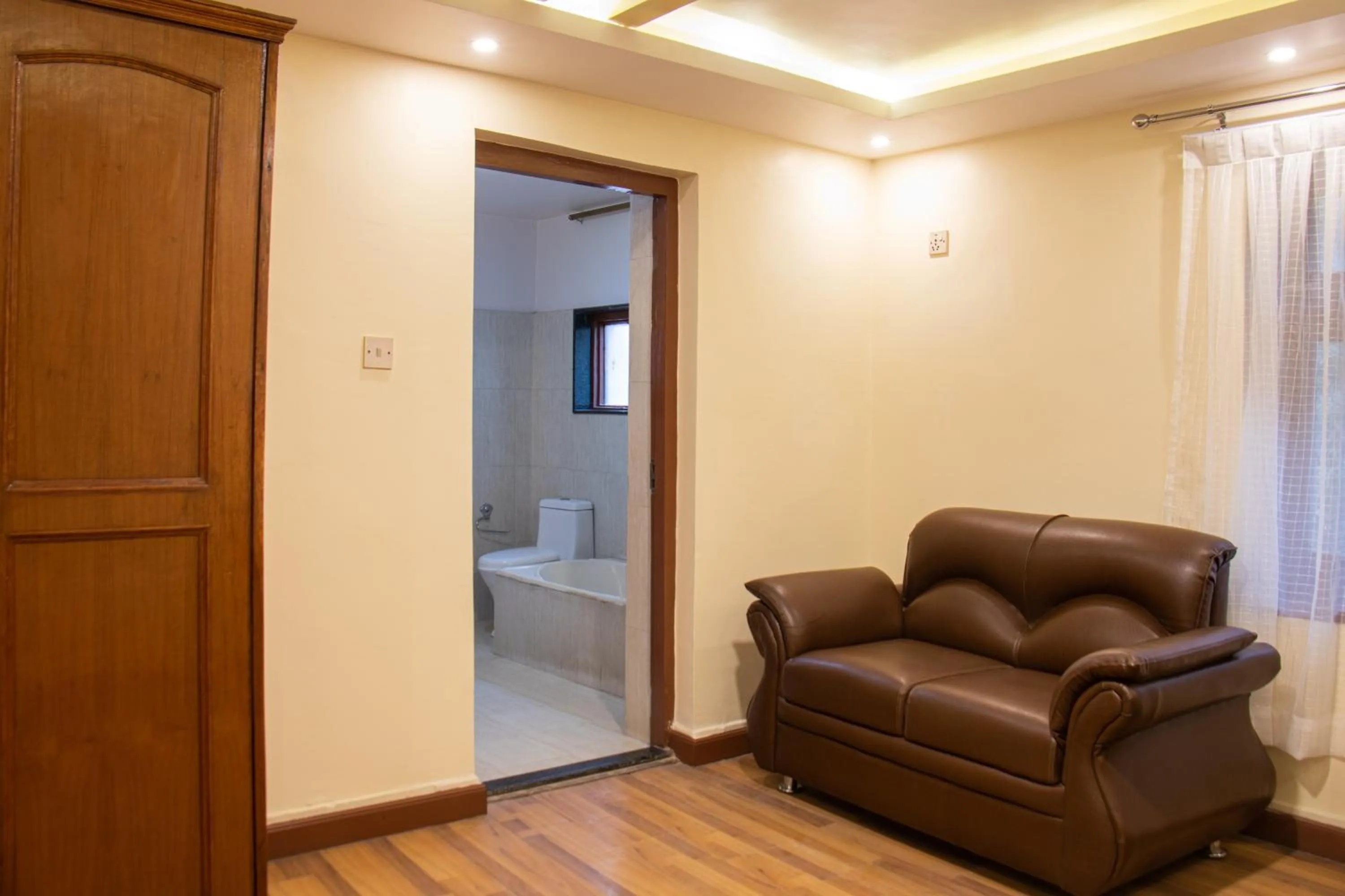 Seating area, Bed in Everland Kathmandu Hotel