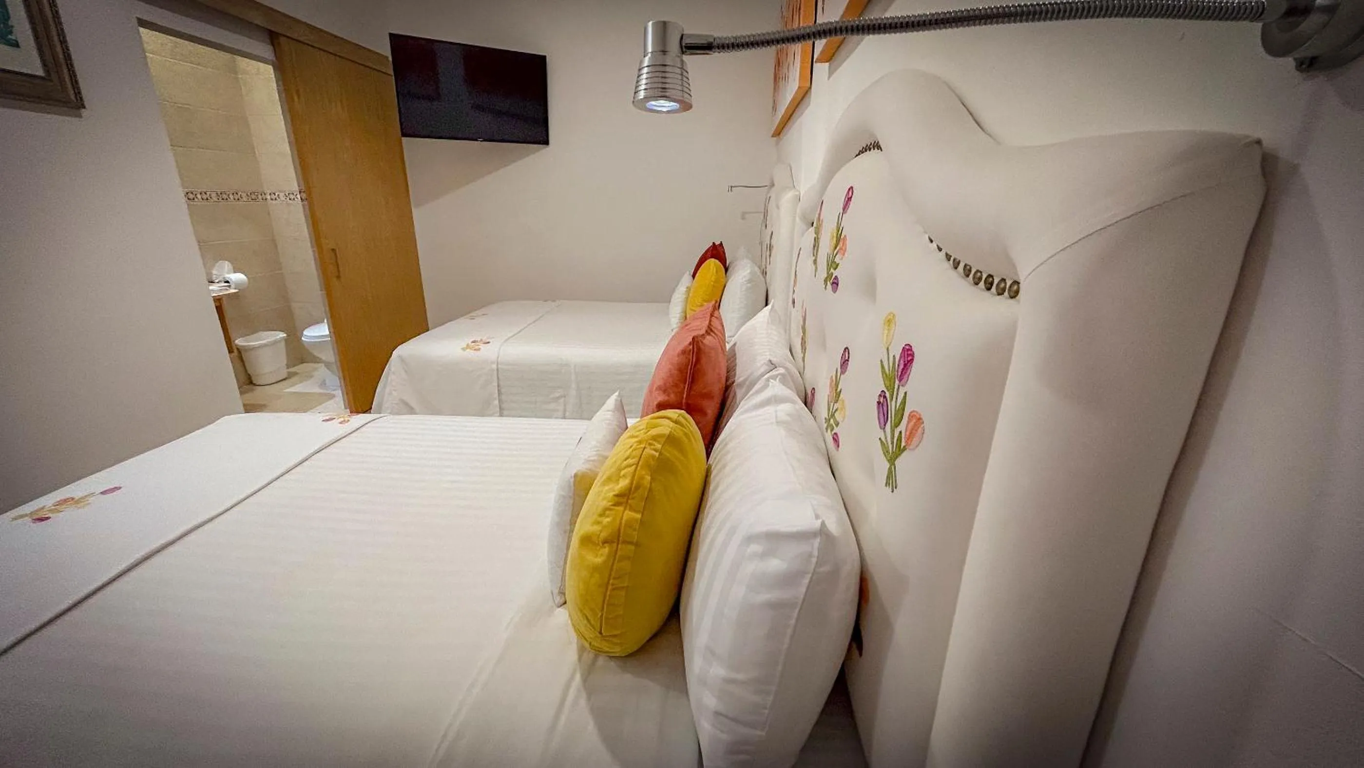 Bed in ArcoSodi Hotel Boutique