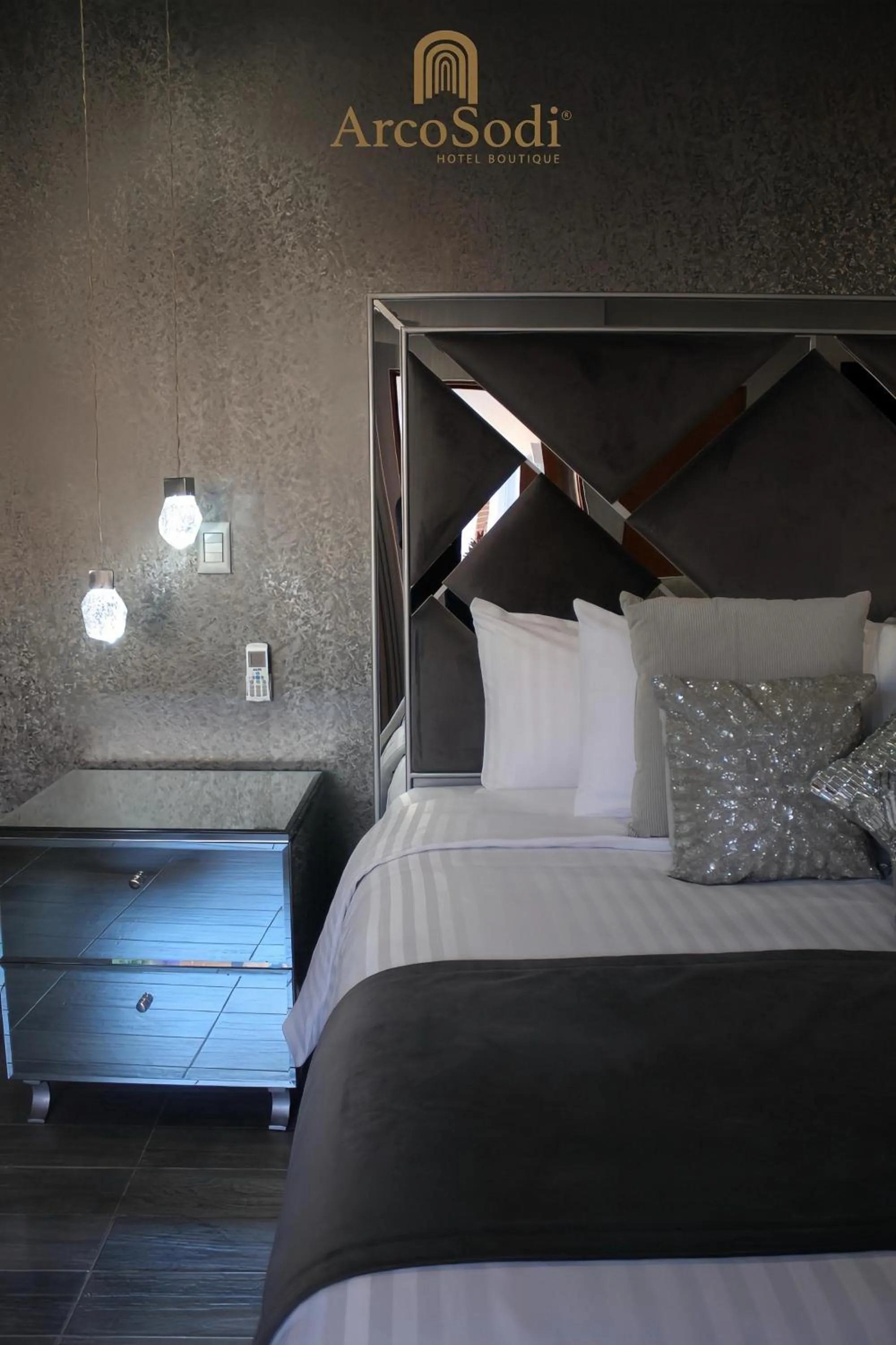 Bed in ArcoSodi Hotel Boutique