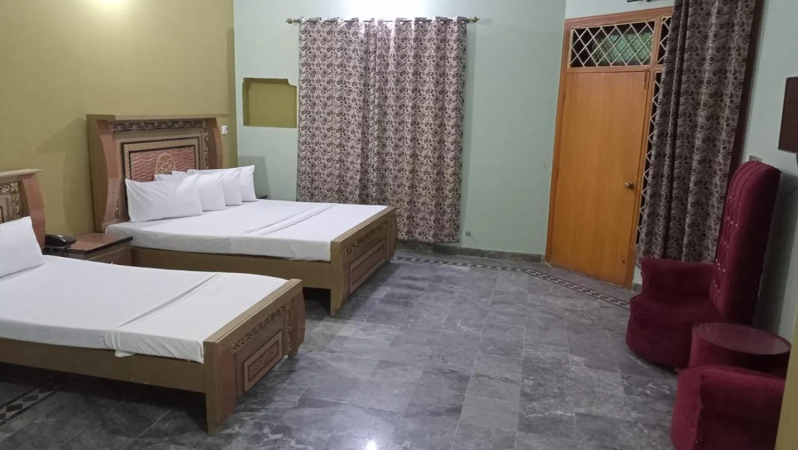 Bed in Hotel Royal Luxury Multan