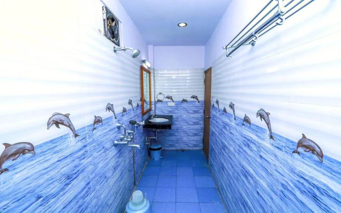 Shower in Pearl Park Beach Resort Private Limited