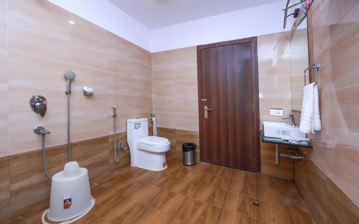 Shower in Pearl Park Beach Resort Private Limited