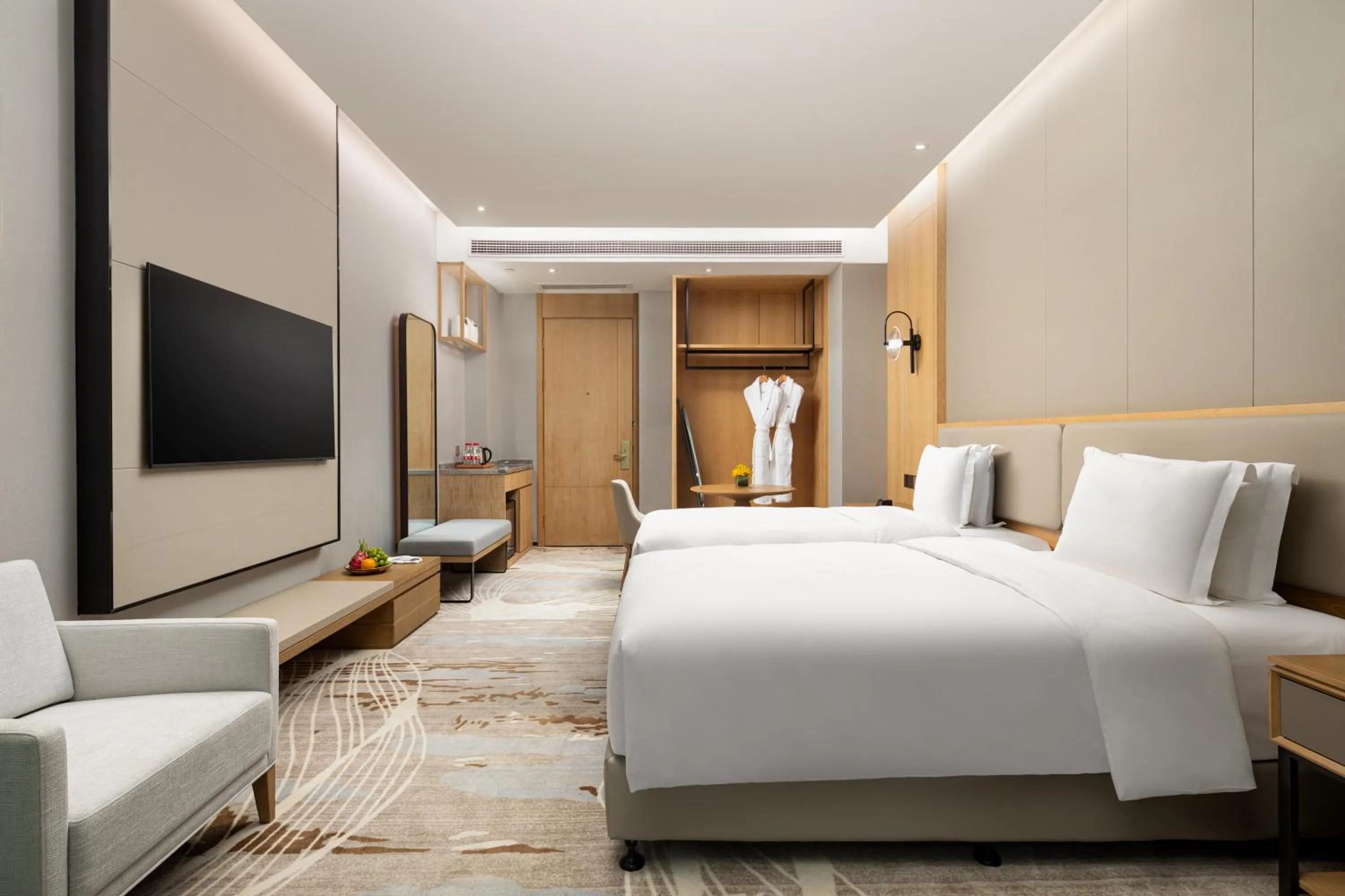 Seating area, Bed in Crowne Plaza Zhoushan Seaview by IHG