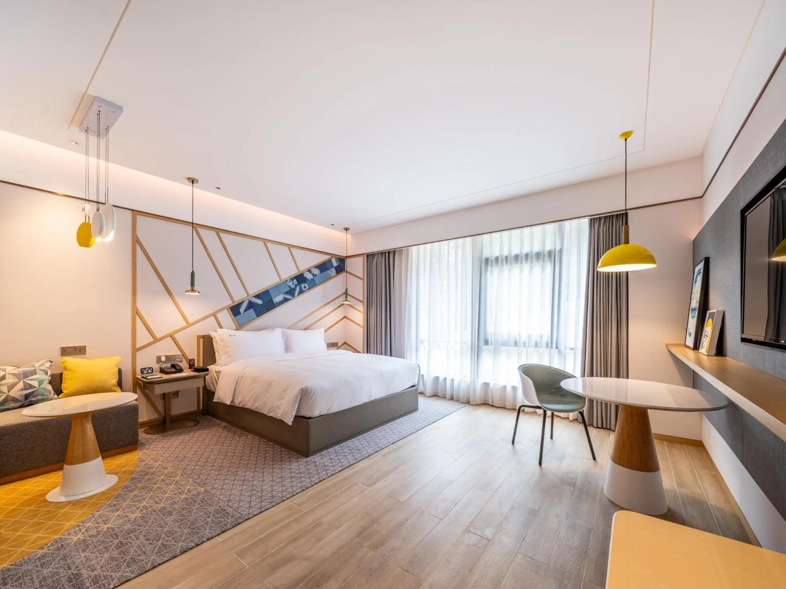 Photo of the whole room, Bed in Holiday Inn Tongren Wanshan by IHG