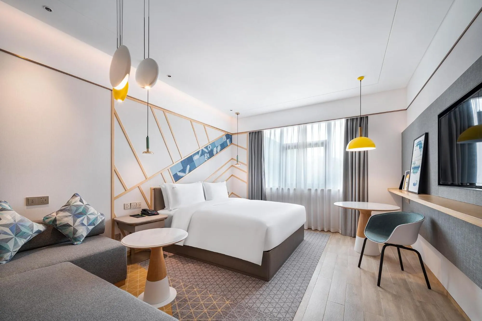 Photo of the whole room, Bed in Holiday Inn Tongren Wanshan by IHG