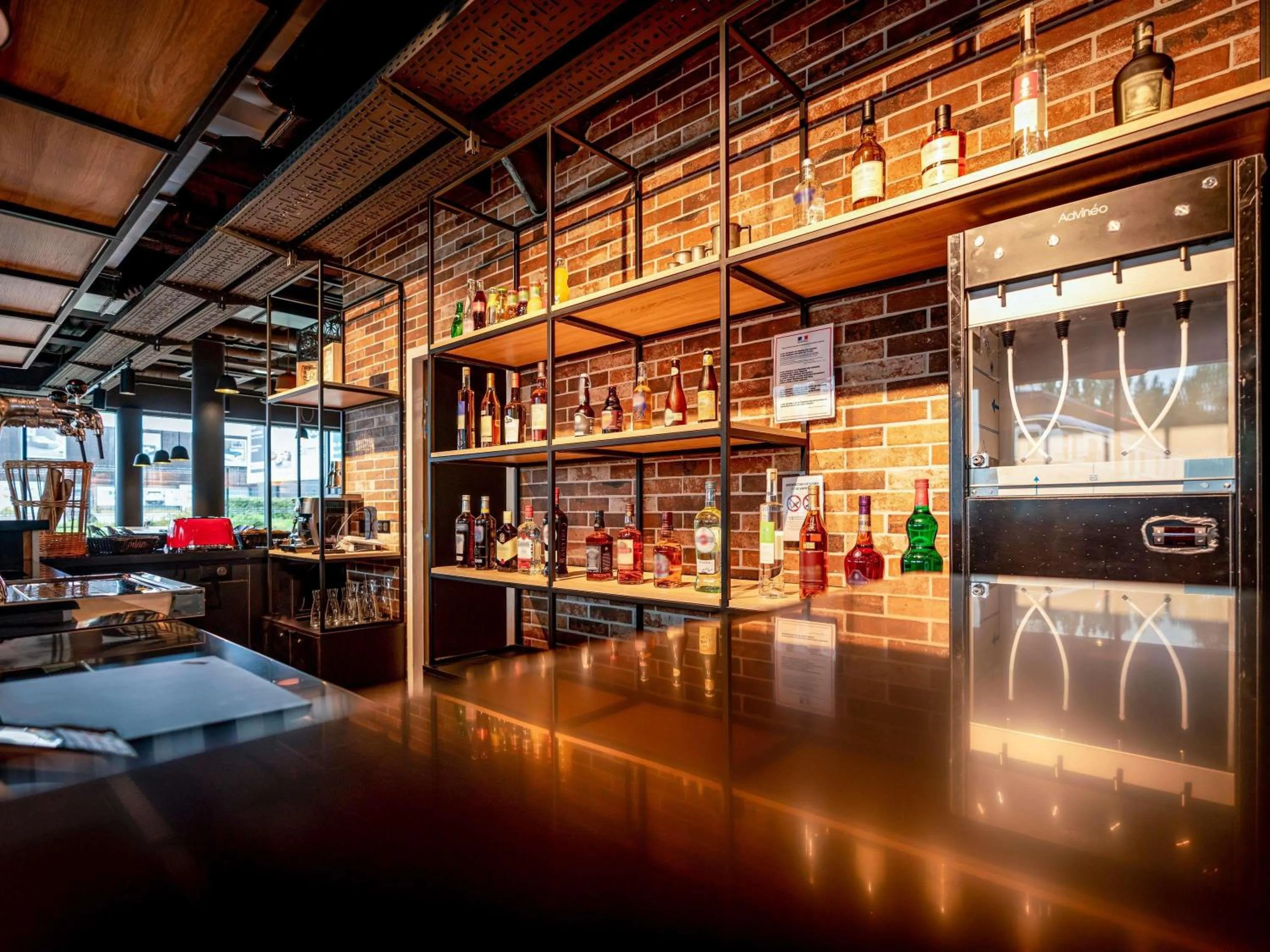 Lounge or bar in ibis Styles Valenciennes Petite Foret