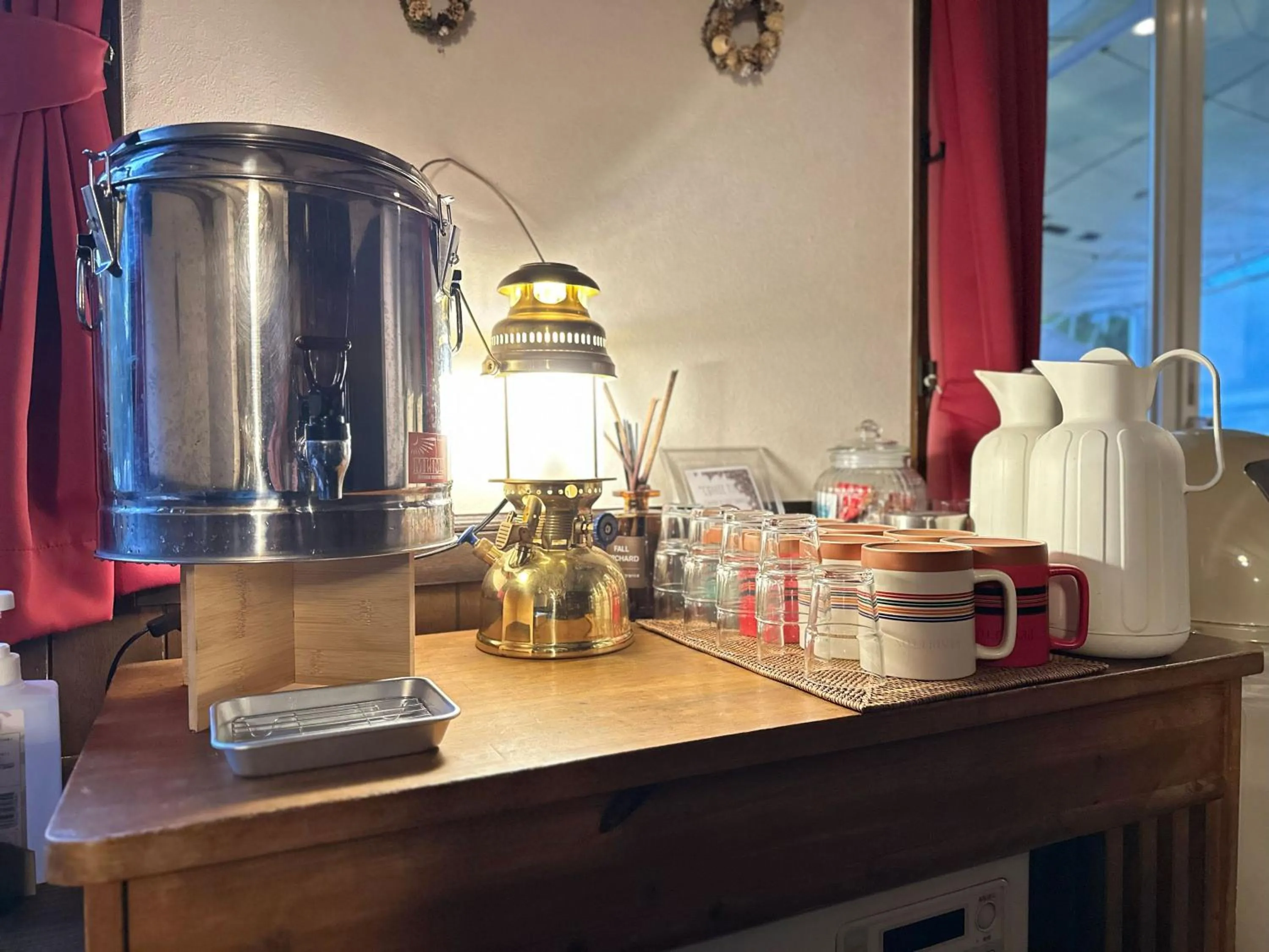 Communal lounge/ TV room in Lakeside Hotels Kuore