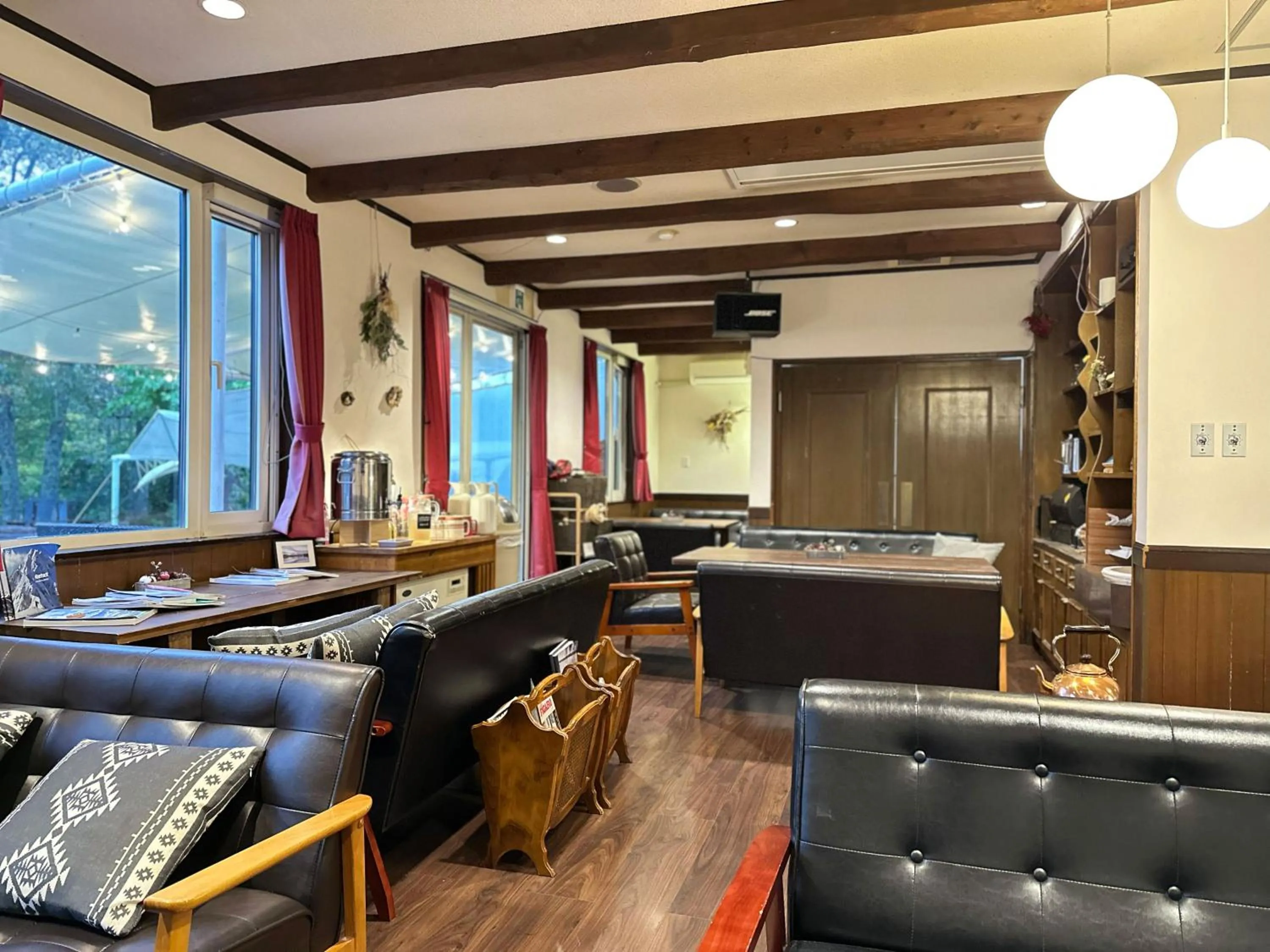 Communal lounge/ TV room in Lakeside Hotels Kuore