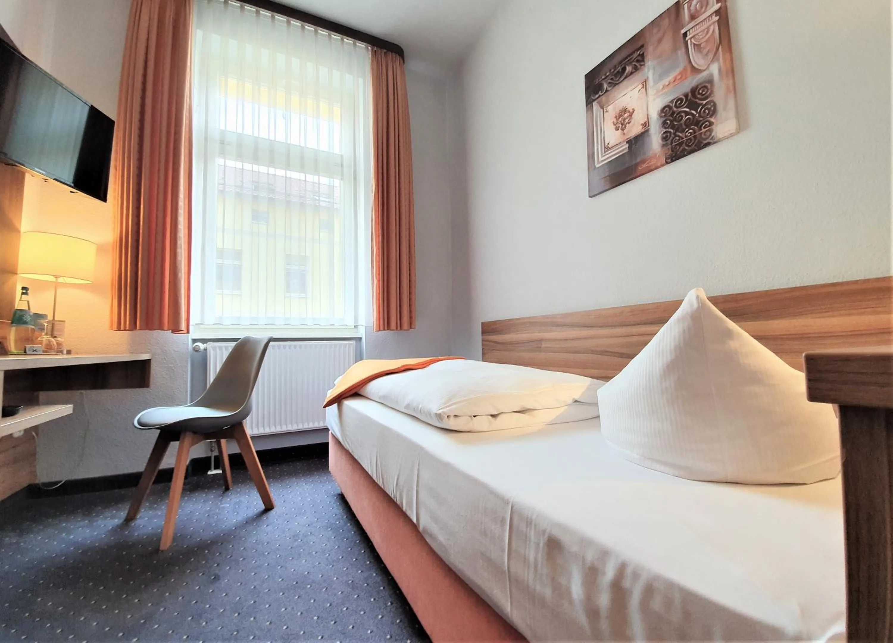 Bed in Melarose Feng Shui Hotel