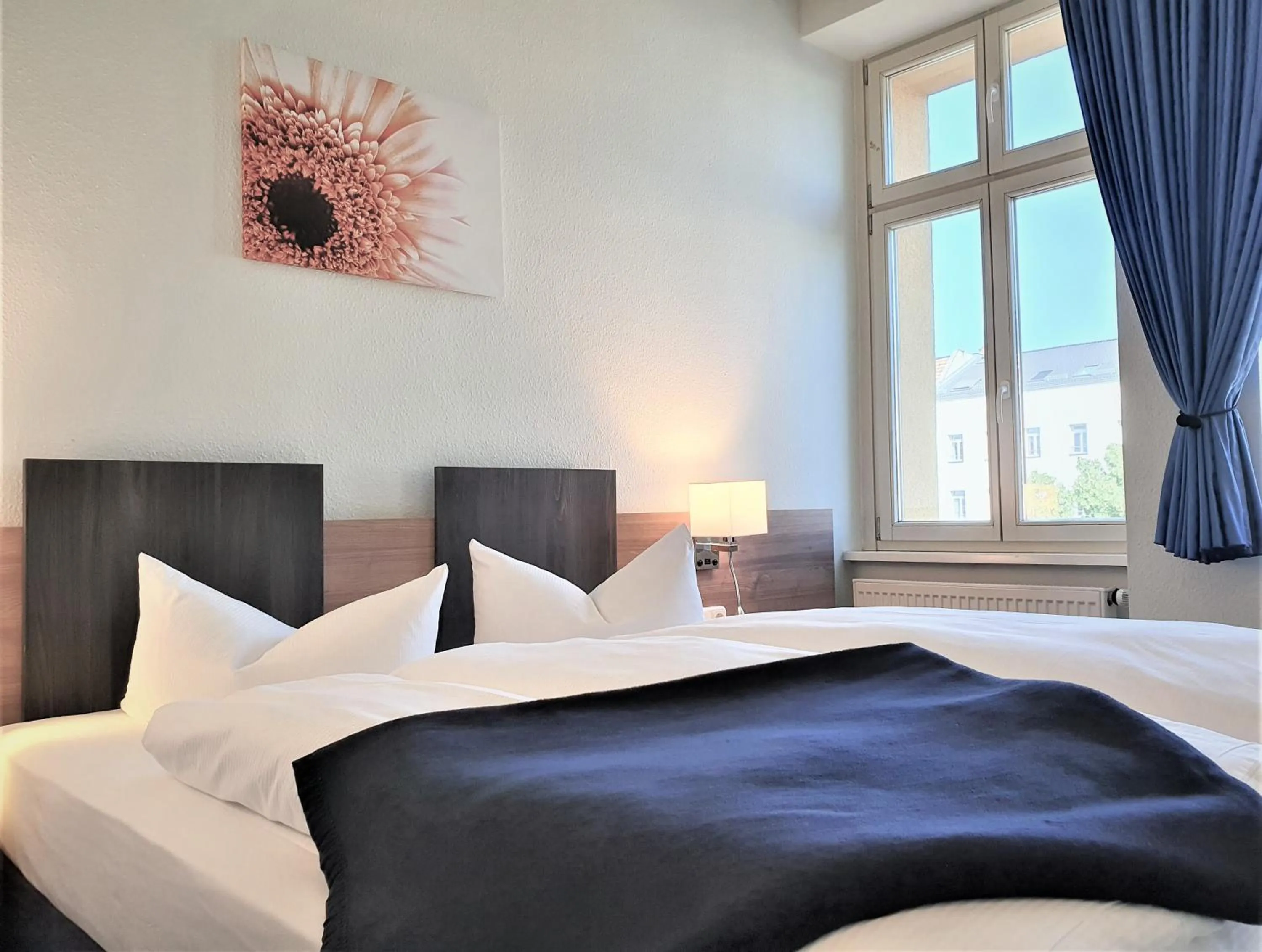 Bed in Melarose Feng Shui Hotel